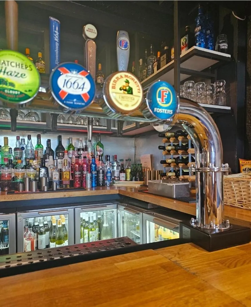 Lounge or bar in Dog and Partridge Inn