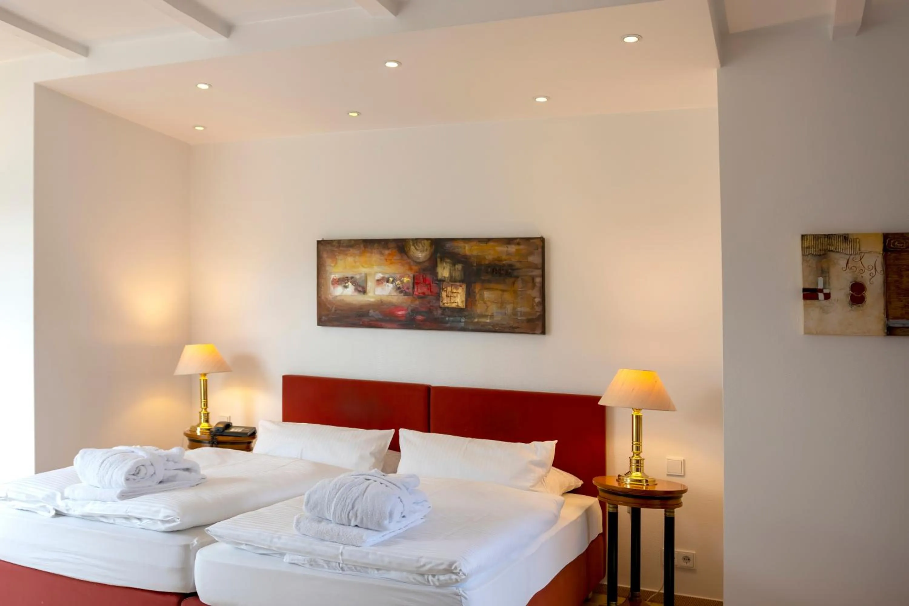 Photo of the whole room, Bed in Golf- und Wellnesshotel Amtsheide