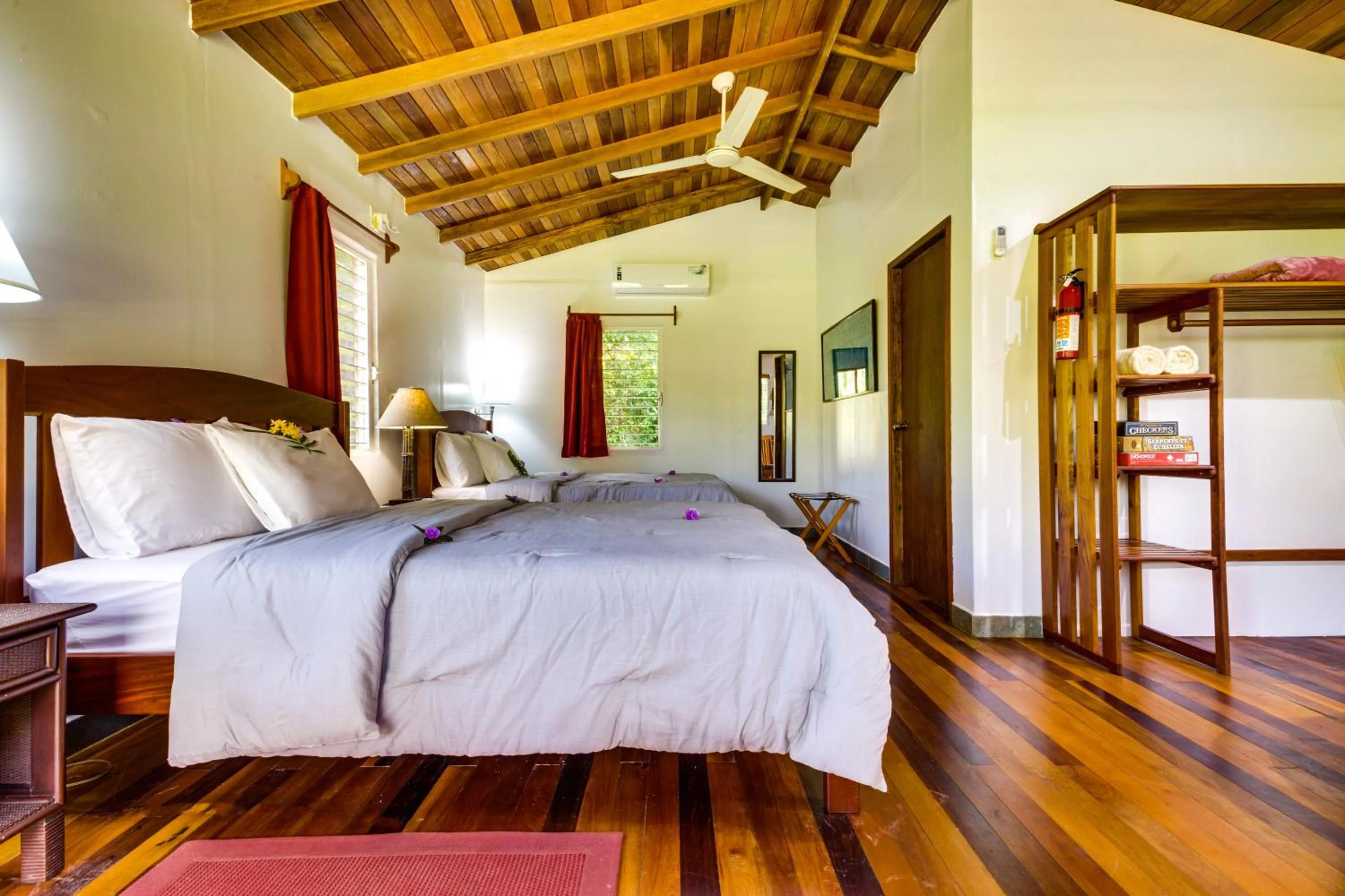Bed in Tanager RainForest Lodge
