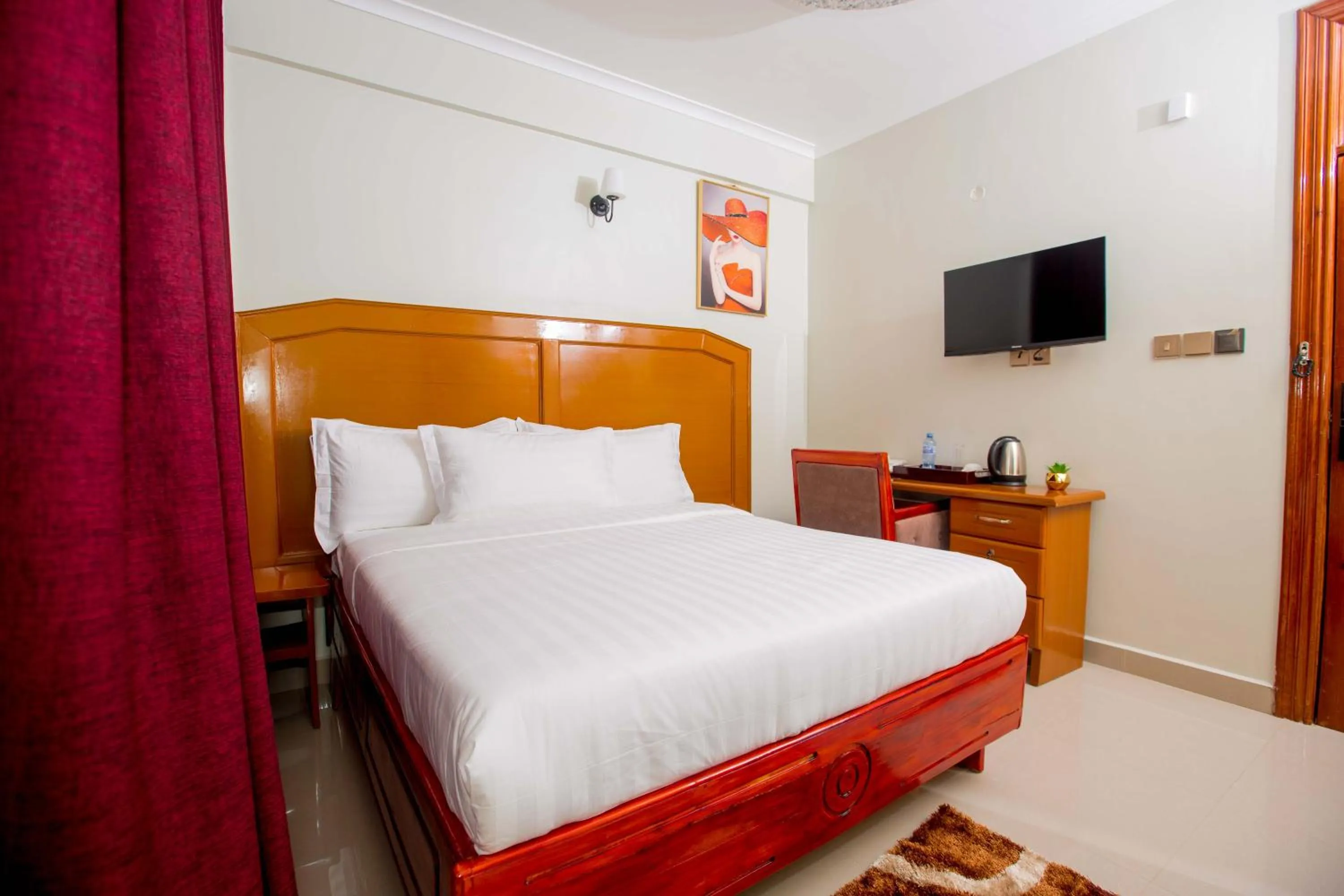 Bed in HADJENS HOTEL