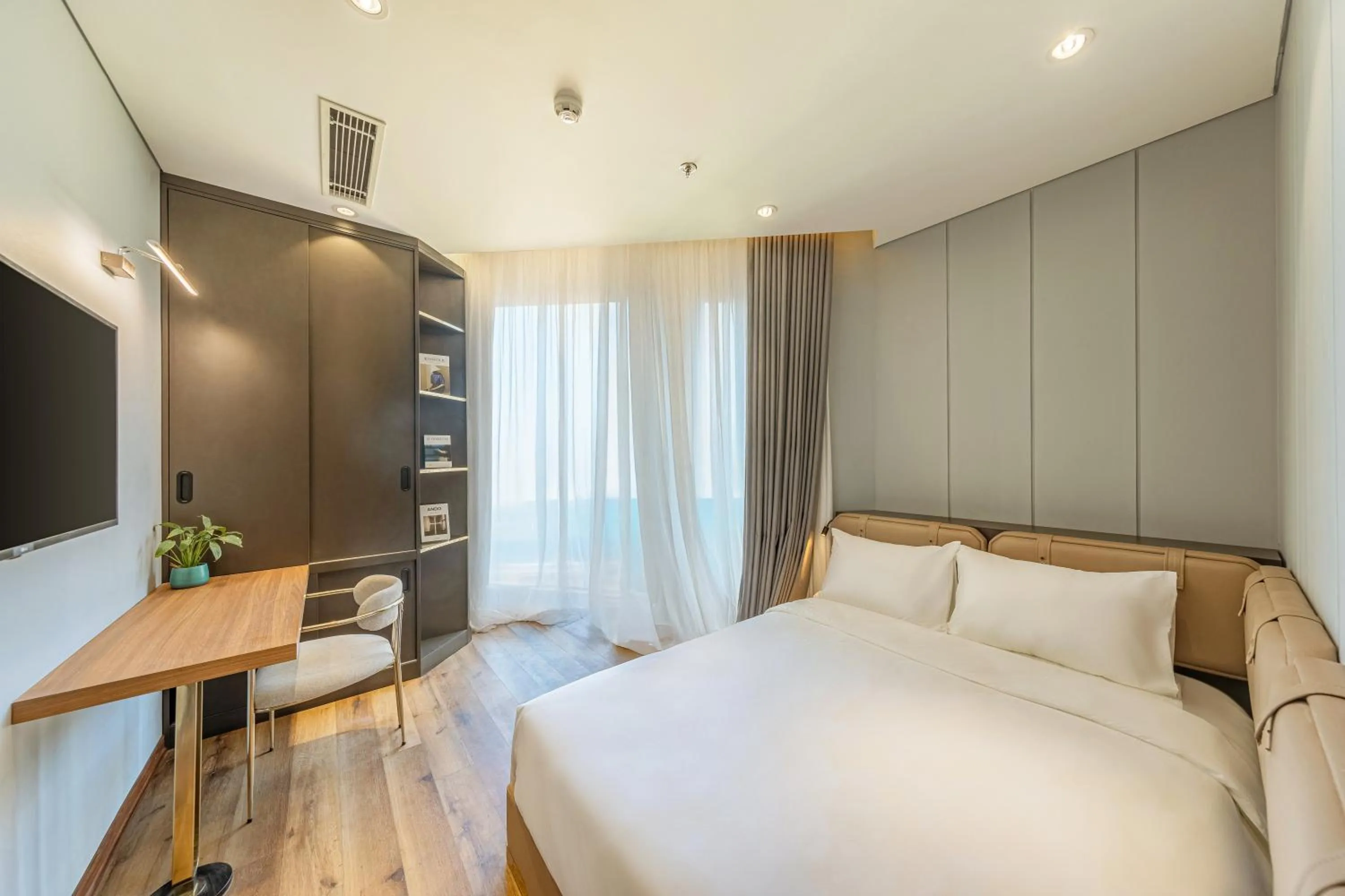 Bed in Taiyo Hotel & Apartment