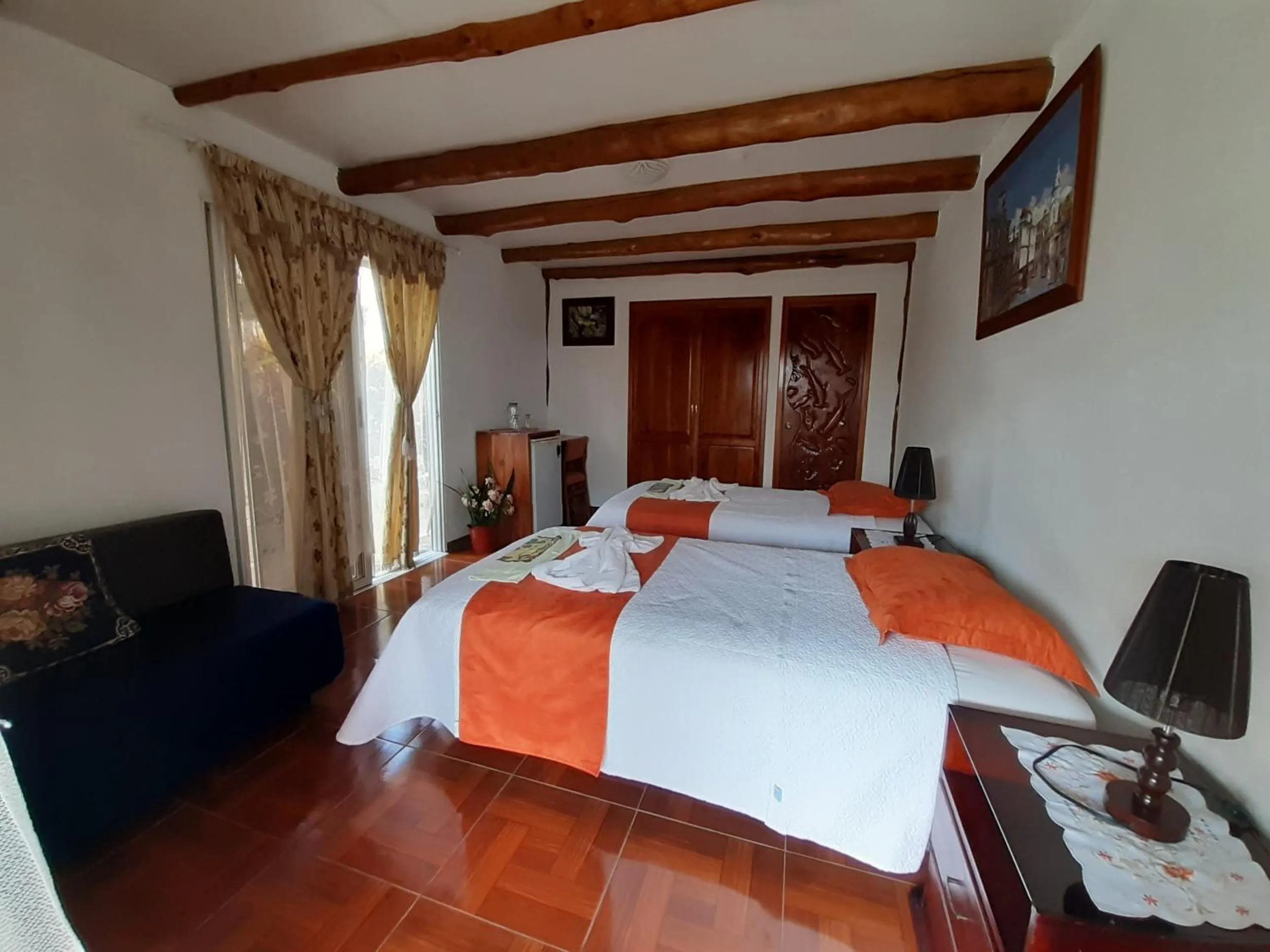 Bed in Suymar Ecolodge Galapagos