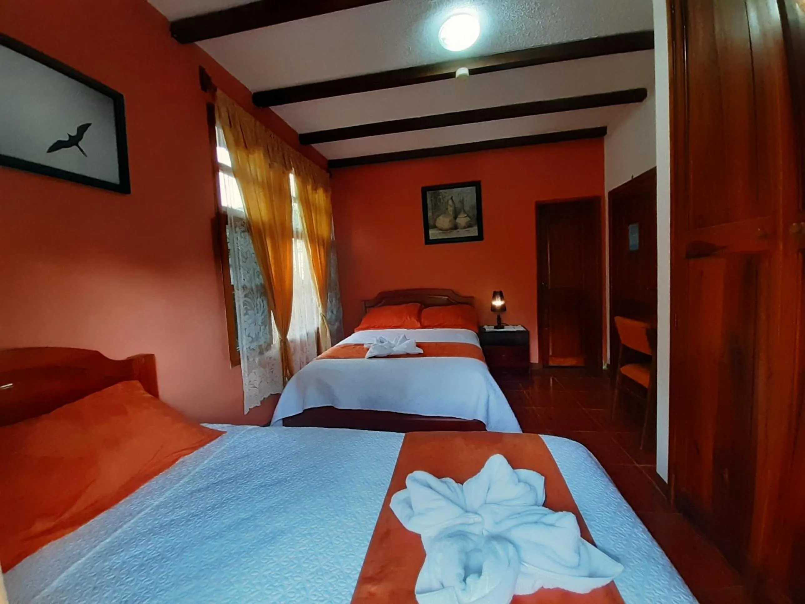 Bed in Suymar Ecolodge Galapagos