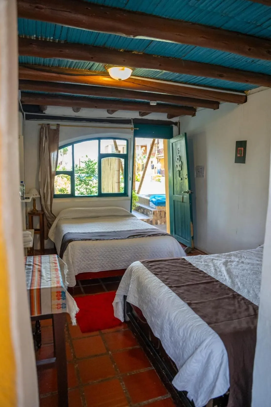 Bed in Hostería Colibri Aeropuerto