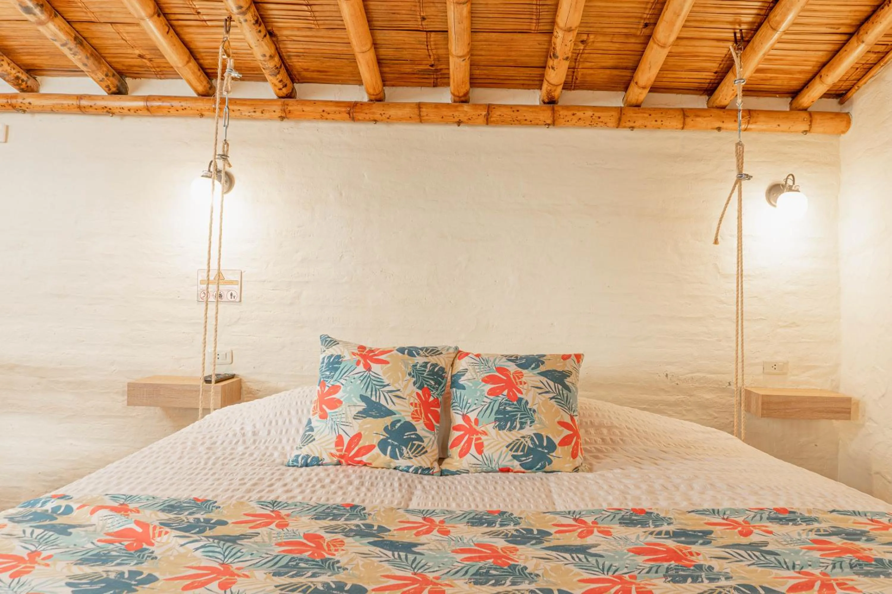 Bed in Hostería Colibri Aeropuerto