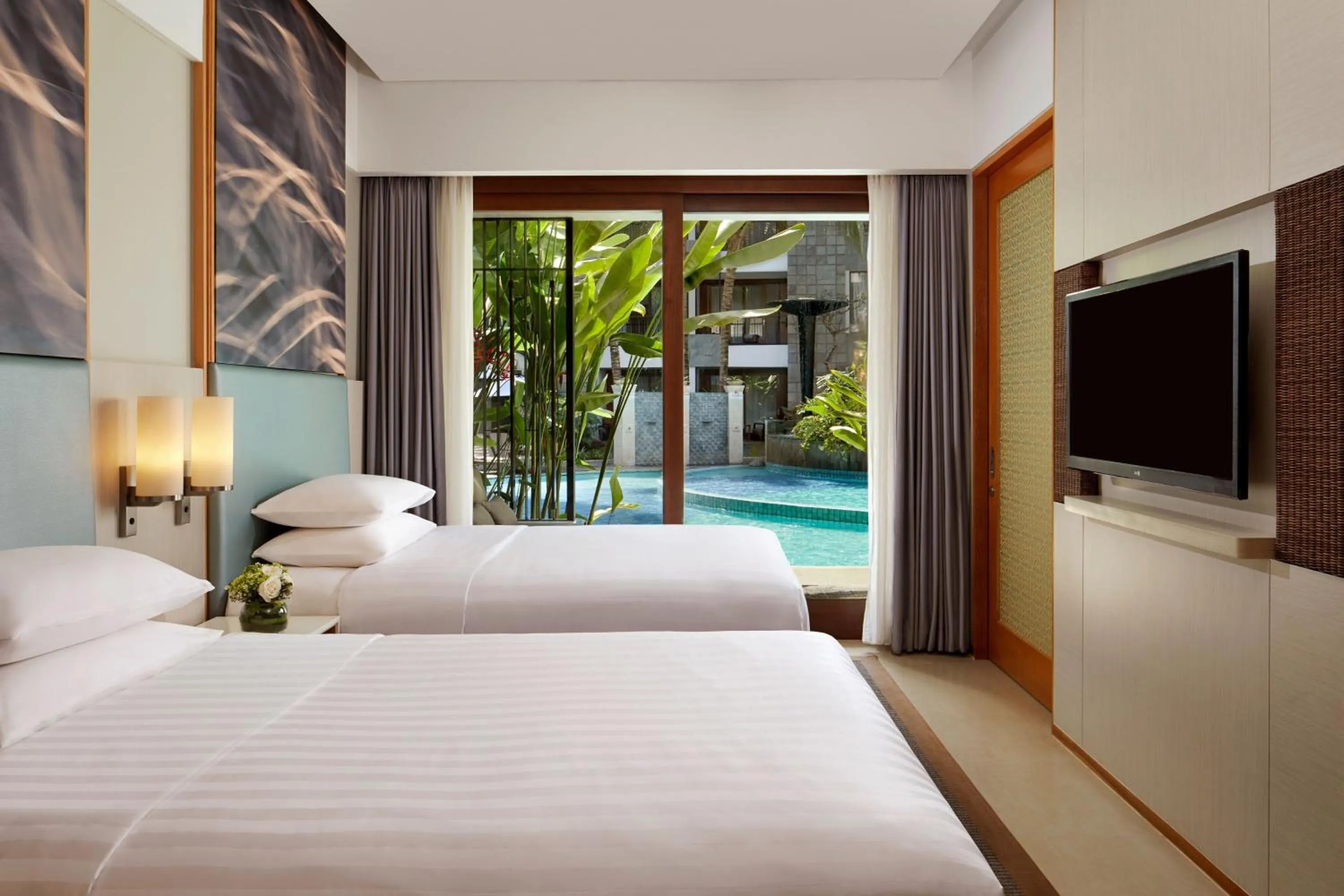 Bed in Courtyard by Marriott Bali Seminyak Resort
