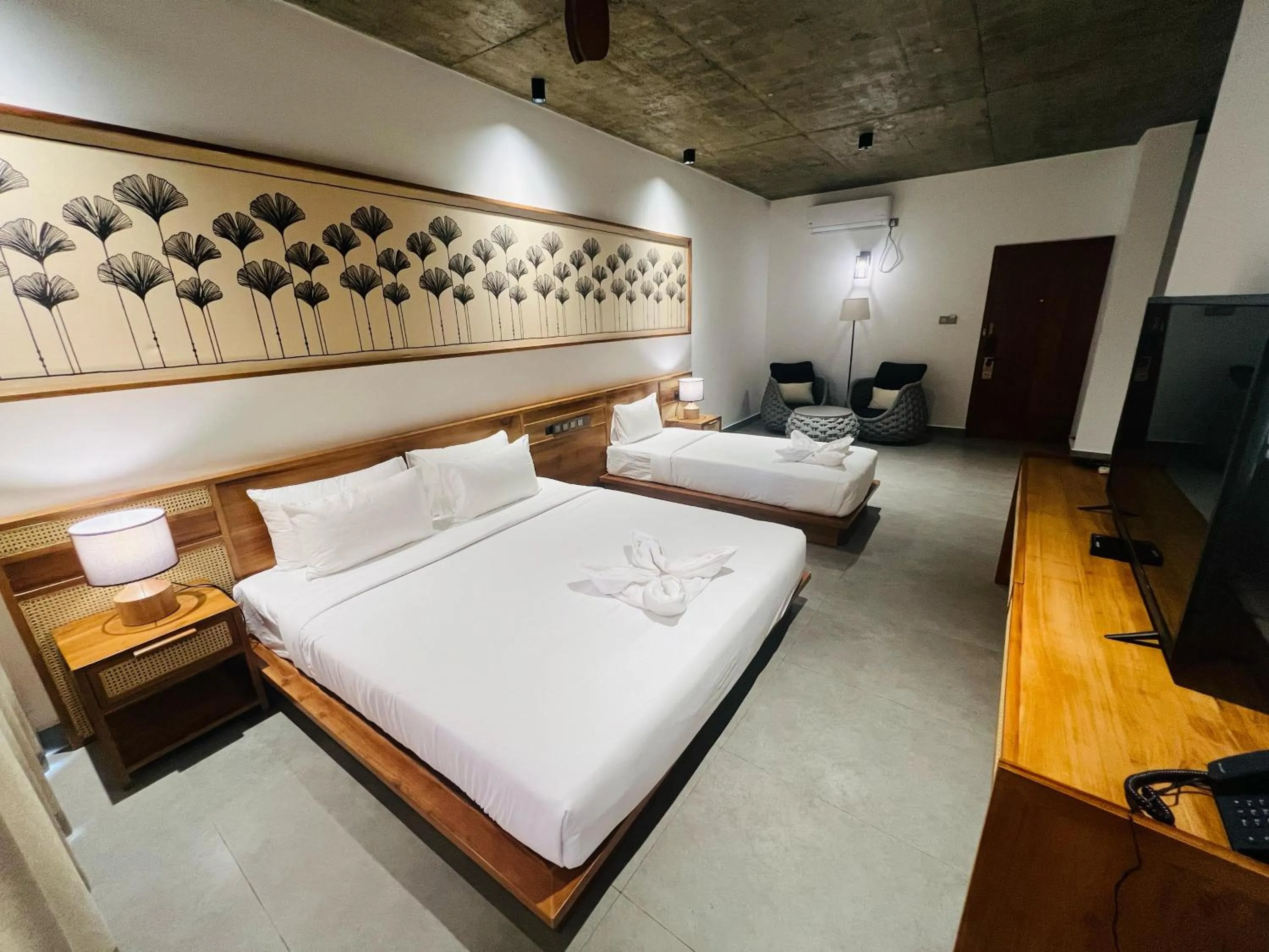 Bed in Ella Flower Garden Resort