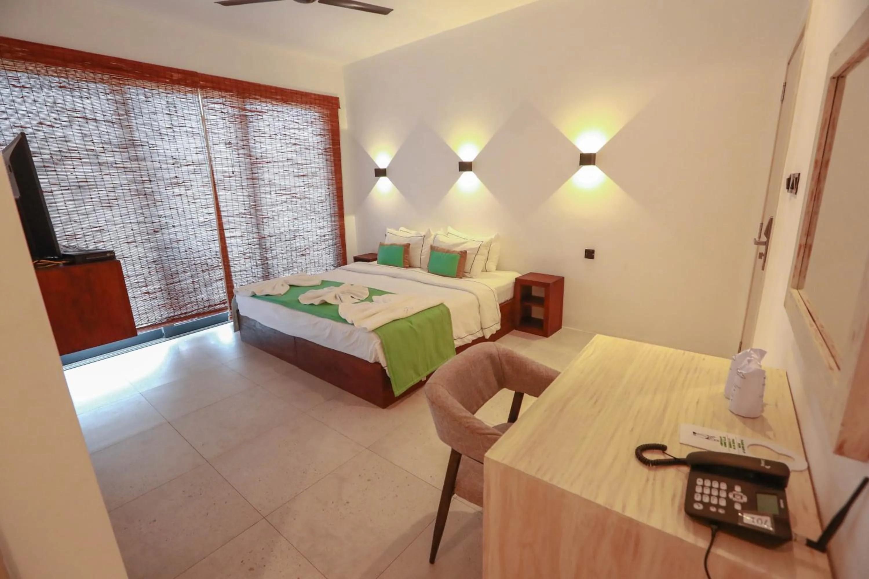 Bed in Ella Flower Garden Resort