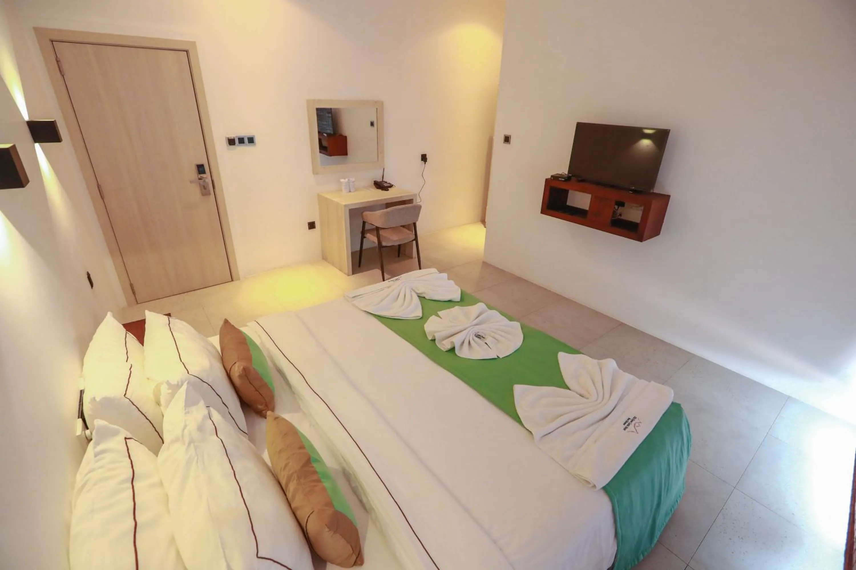 Bed in Ella Flower Garden Resort