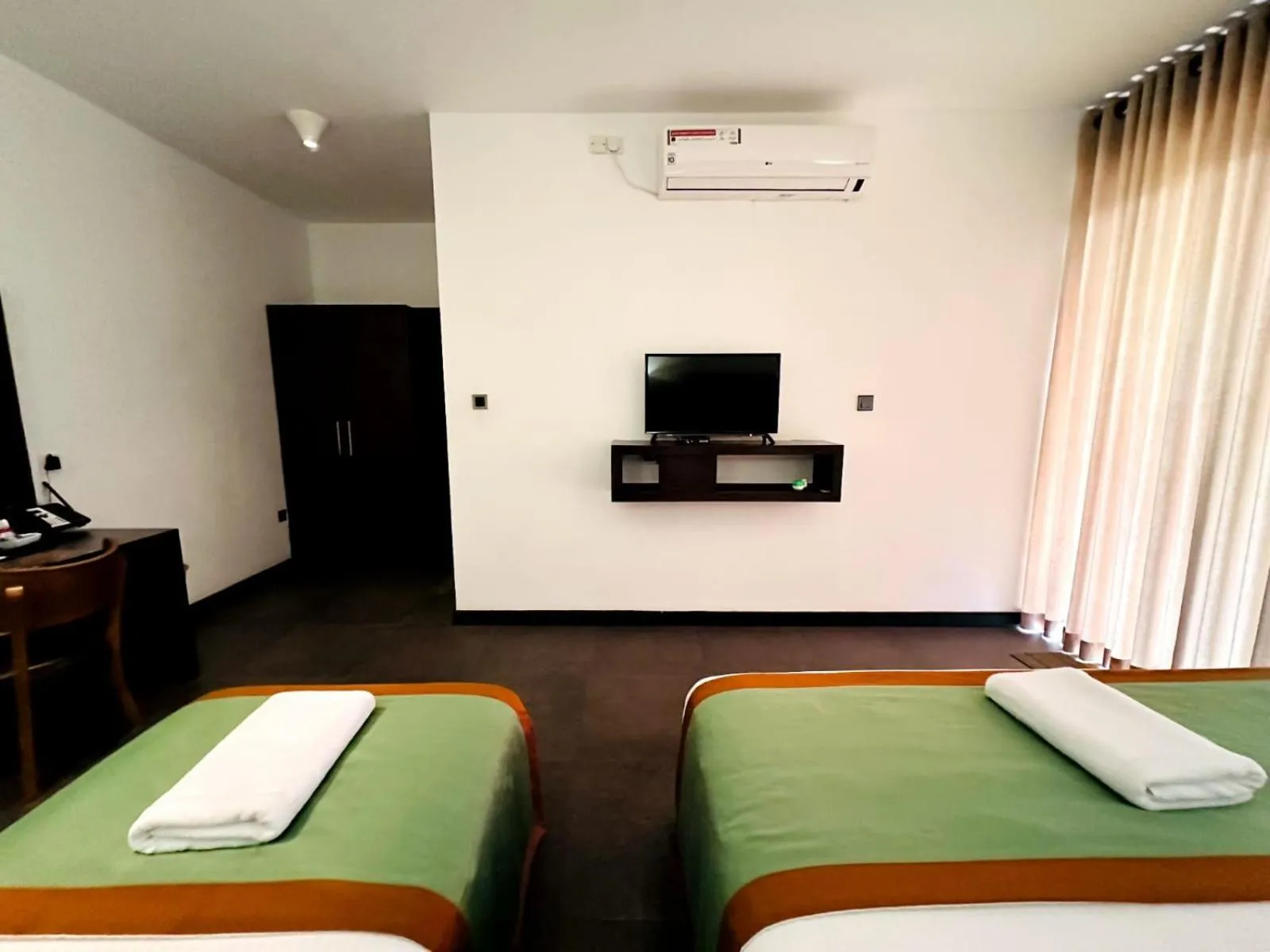 Bed in Ella Flower Garden Resort