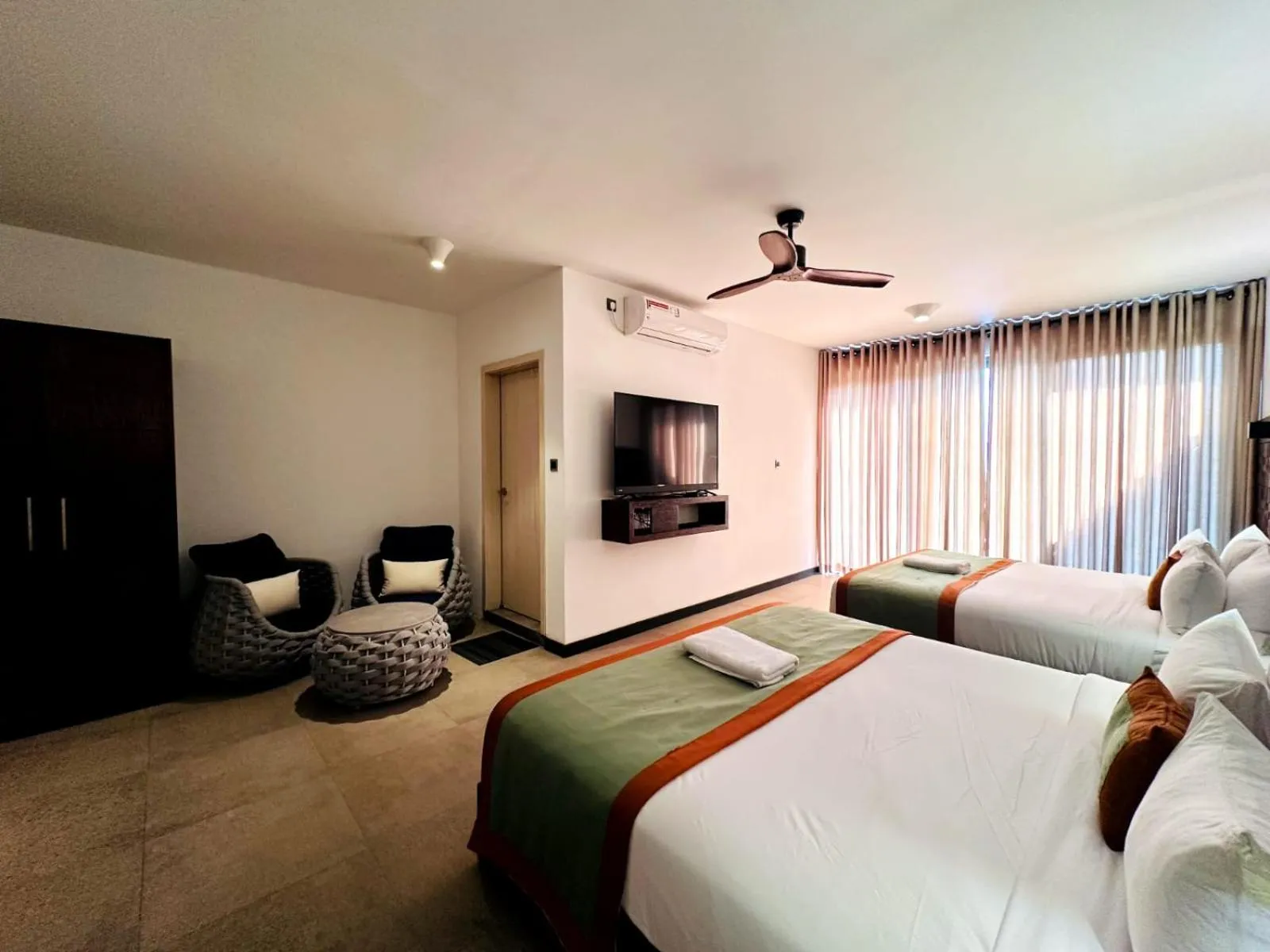 Bed in Ella Flower Garden Resort