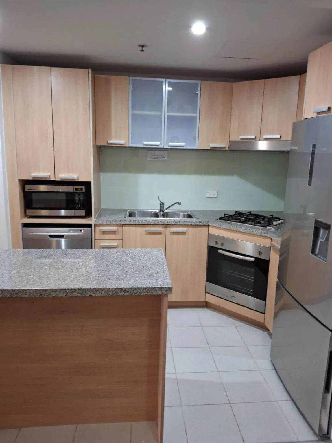 kitchen in Newcastle Central Plaza Apartment Hotel Official
