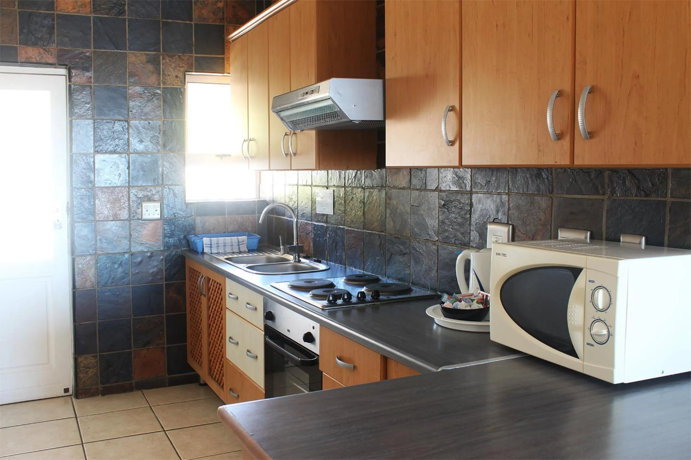 Kitchen or kitchenette in Oceans Hotel & Self Catering