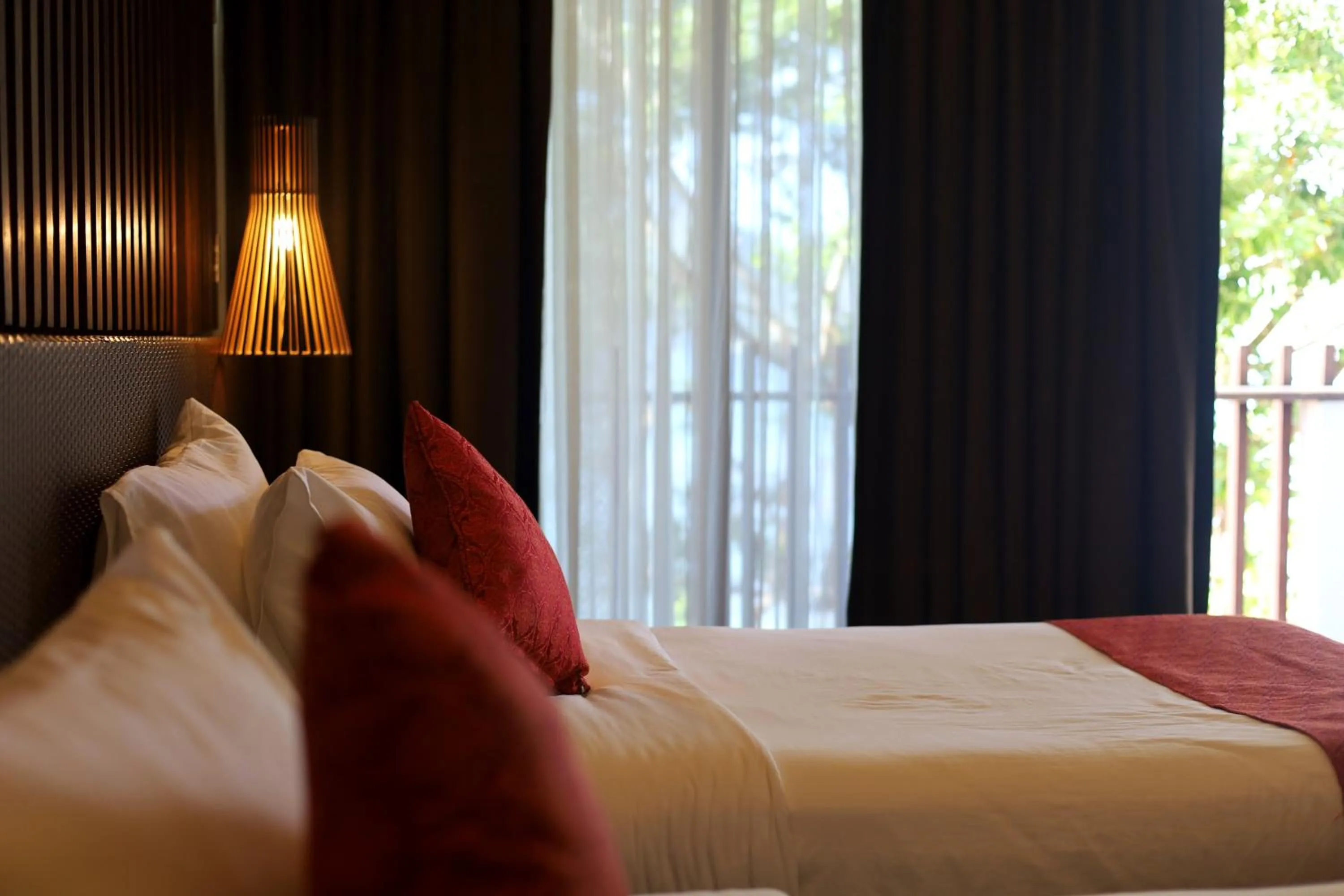 Bed in Orange Pearl Beach Resort