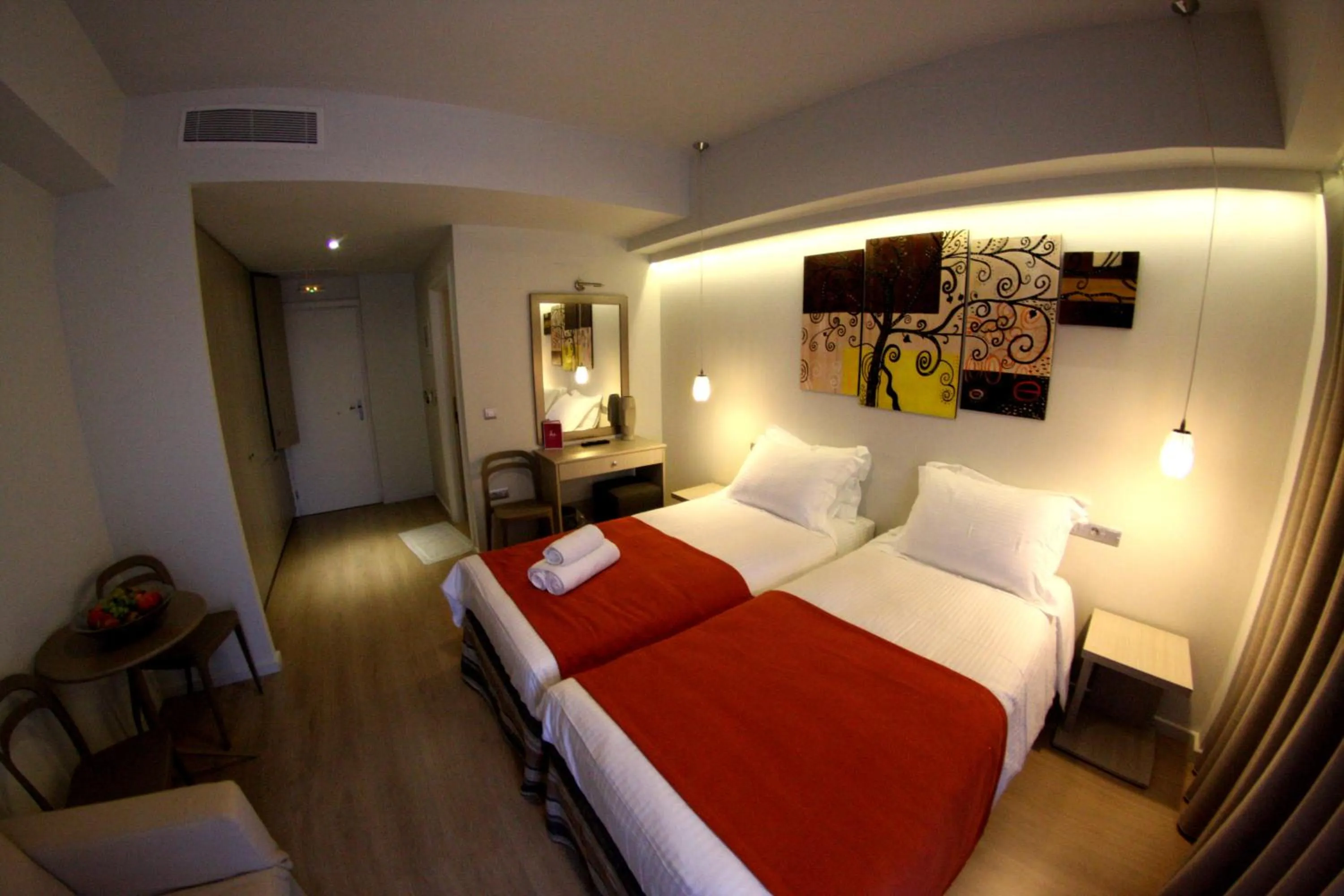 Photo of the whole room, Bed in Aura Boutique