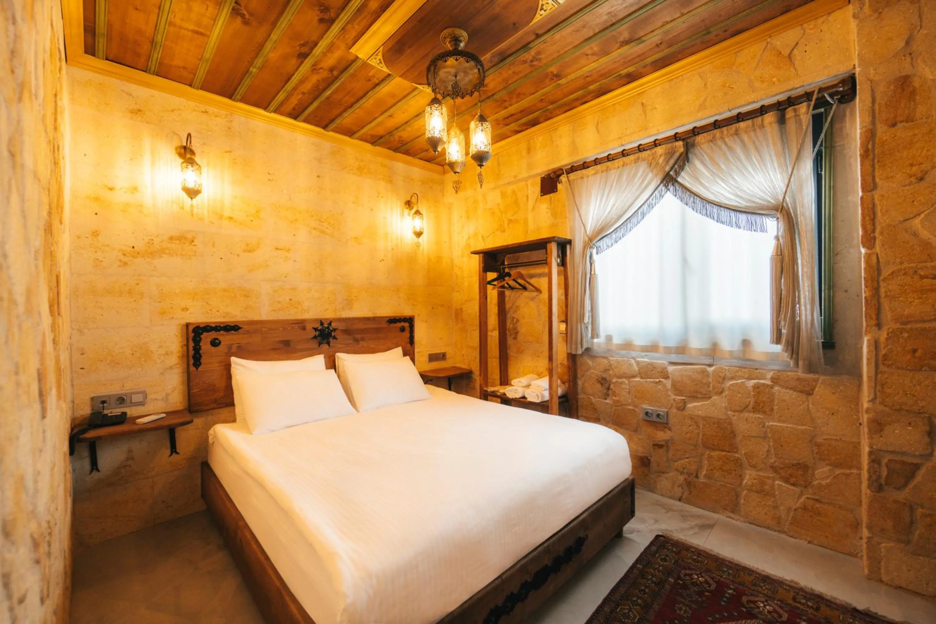 Bed in İncebey Konak Cappadocia