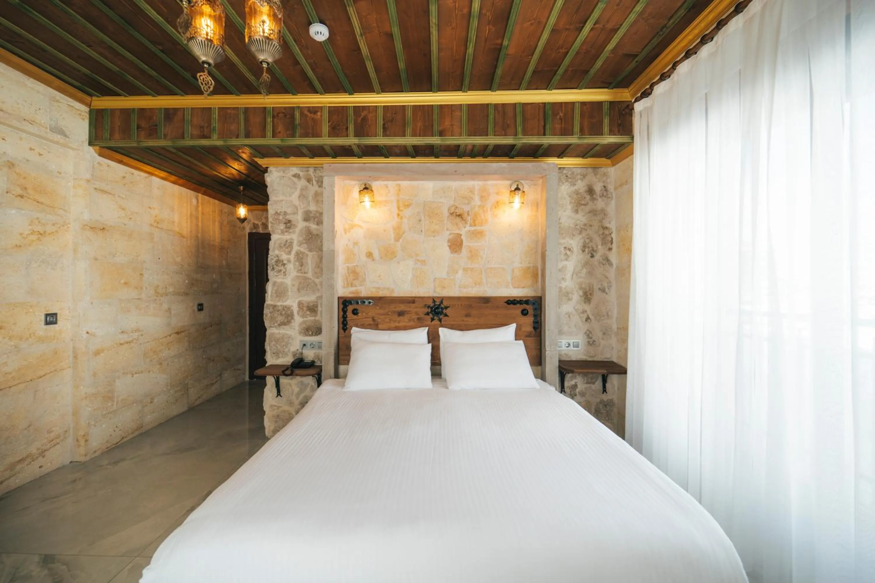 Bed in İncebey Konak Cappadocia