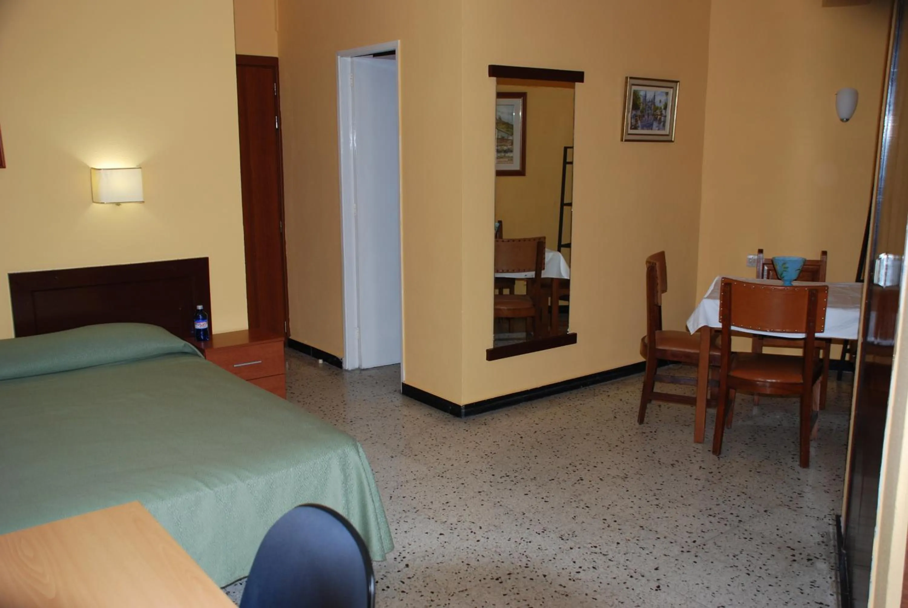 Bed in Hotel Olympia