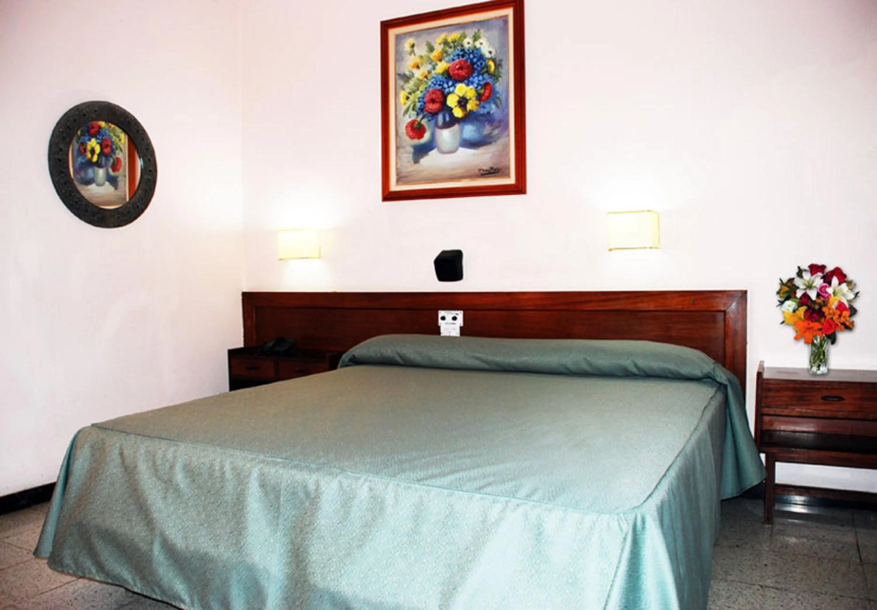 Bed in Hotel Olympia