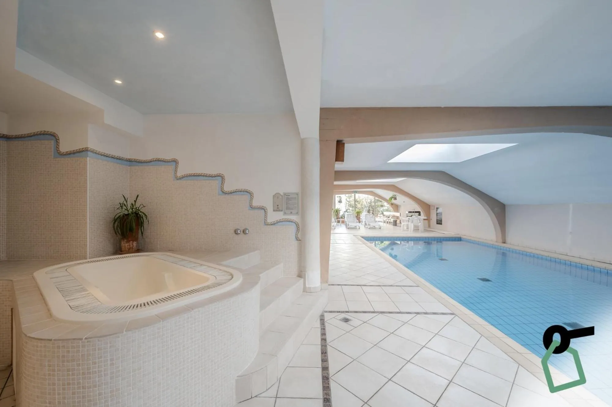 Swimming pool in HOTIDAY Apartment Collection - San Martino
