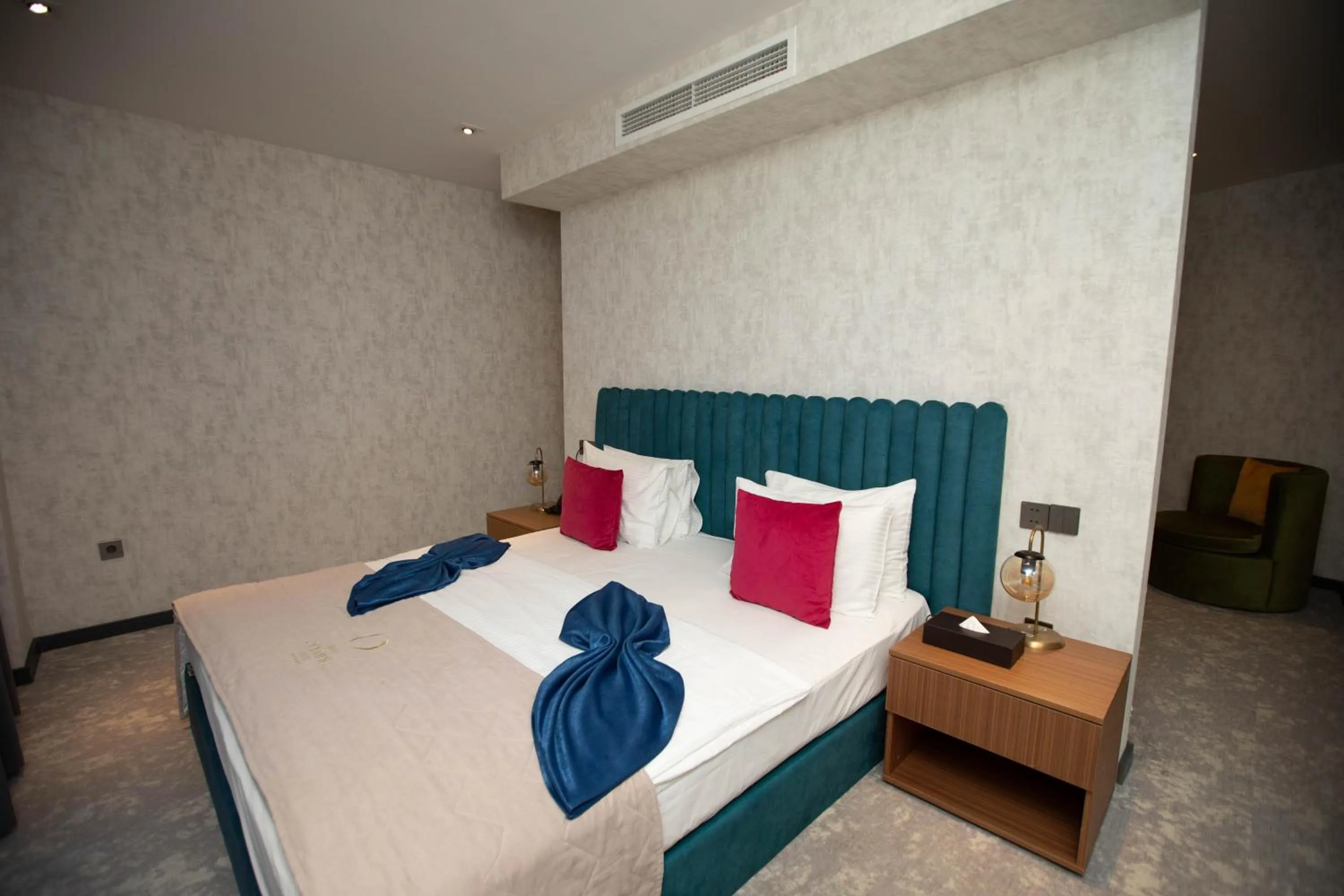 Bed in Arena Grand Hotel