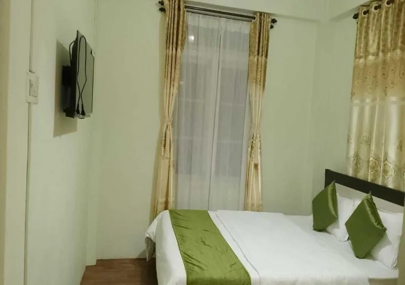 Bed in Rolyda Guest House