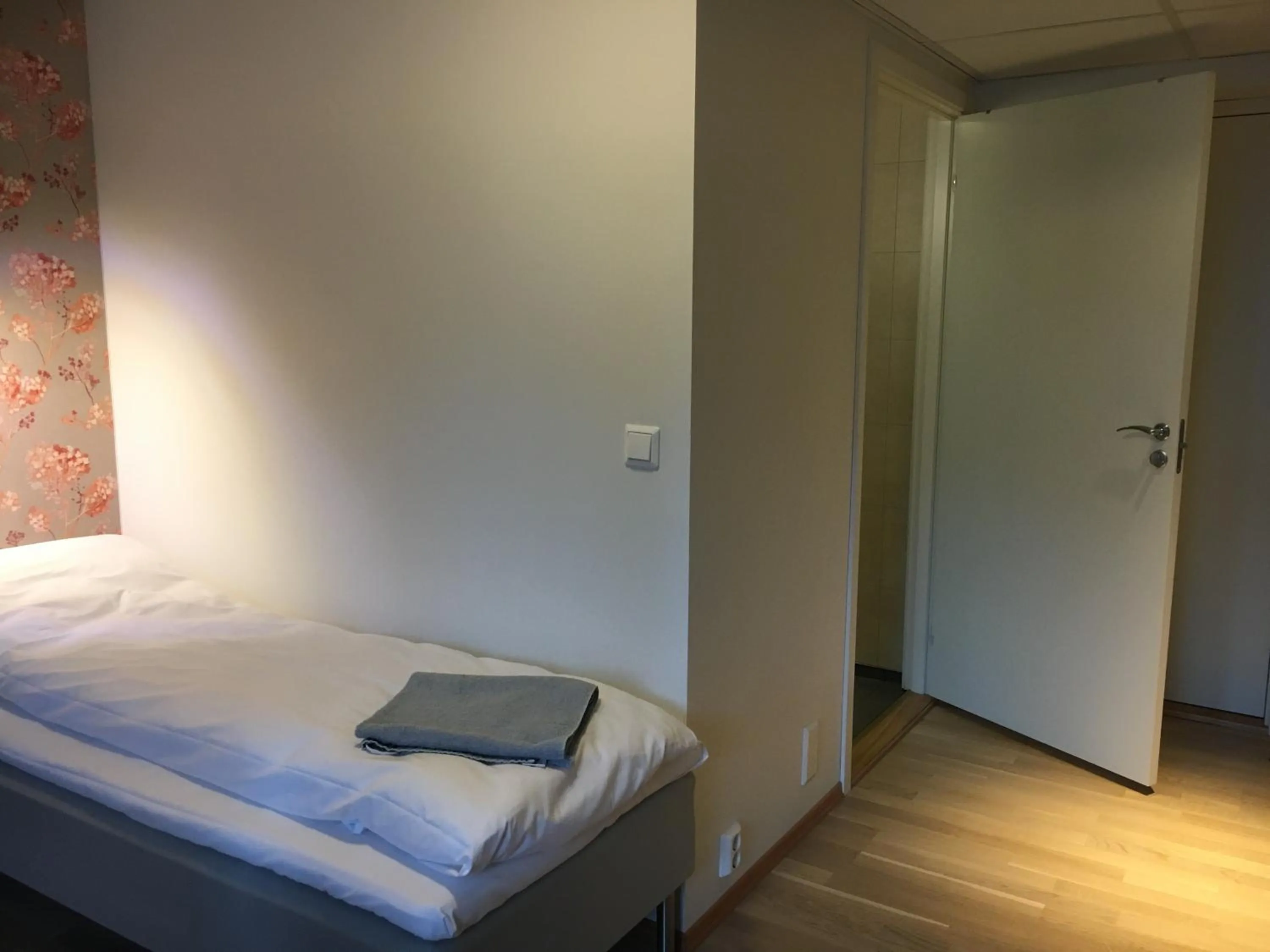 Bed in Sentrumsgården Motell AS