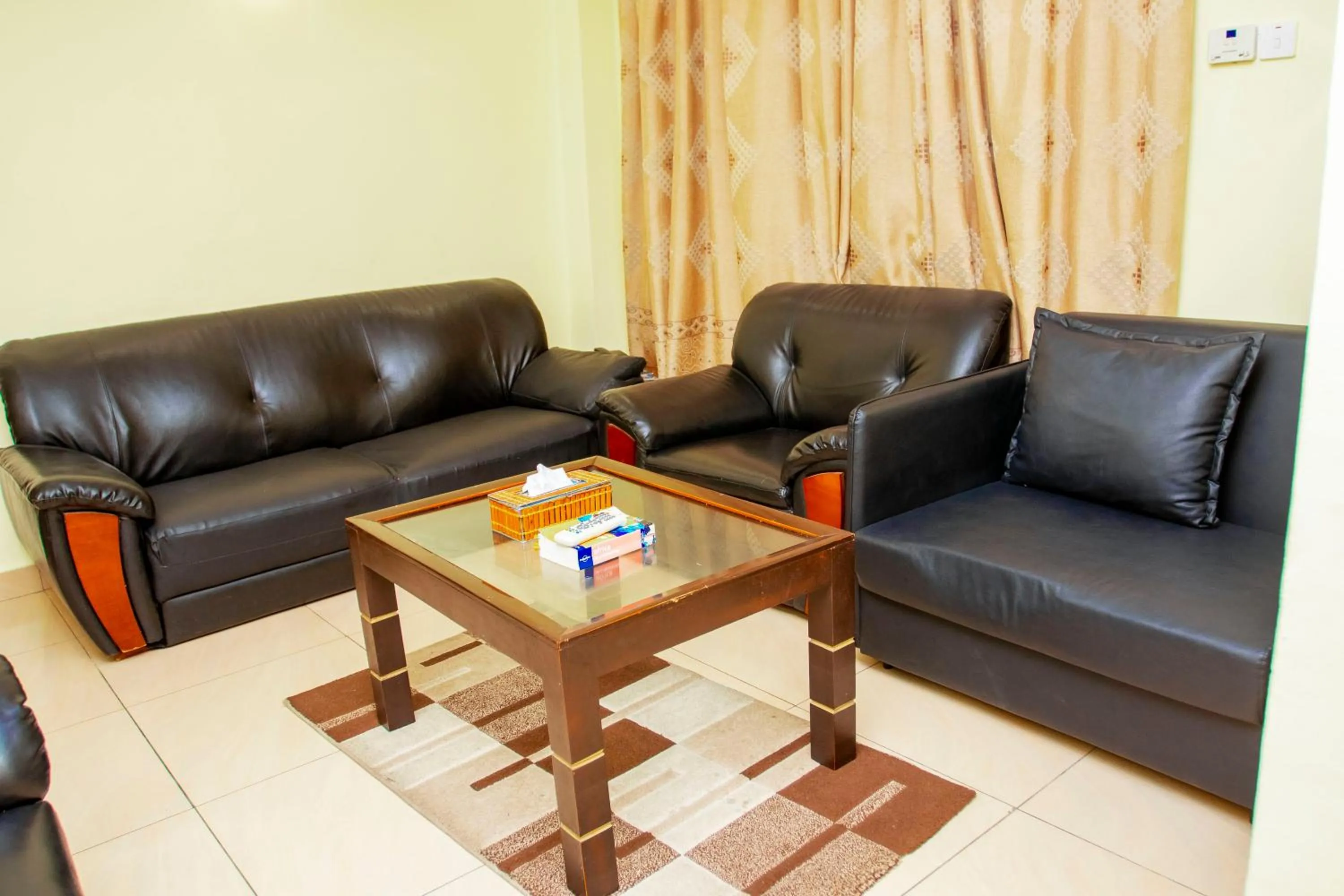 Living room in Sleep Inn Hotel - Kariakoo