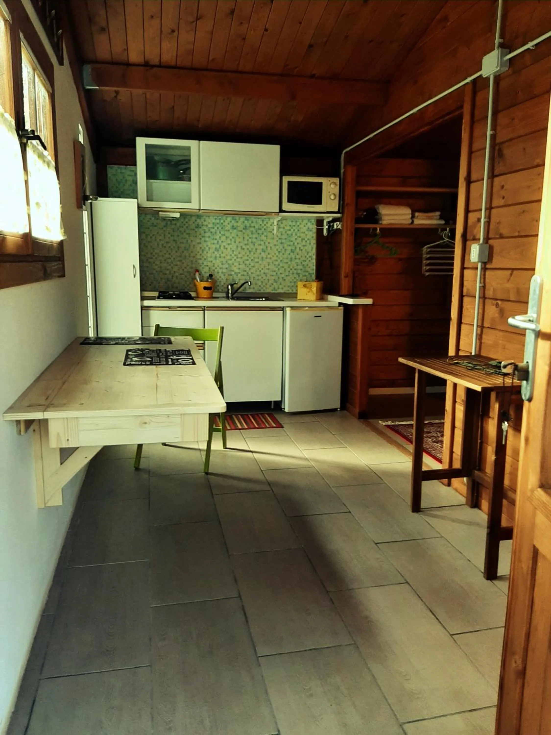 Kitchen or kitchenette in casa di campagna dal pozzo