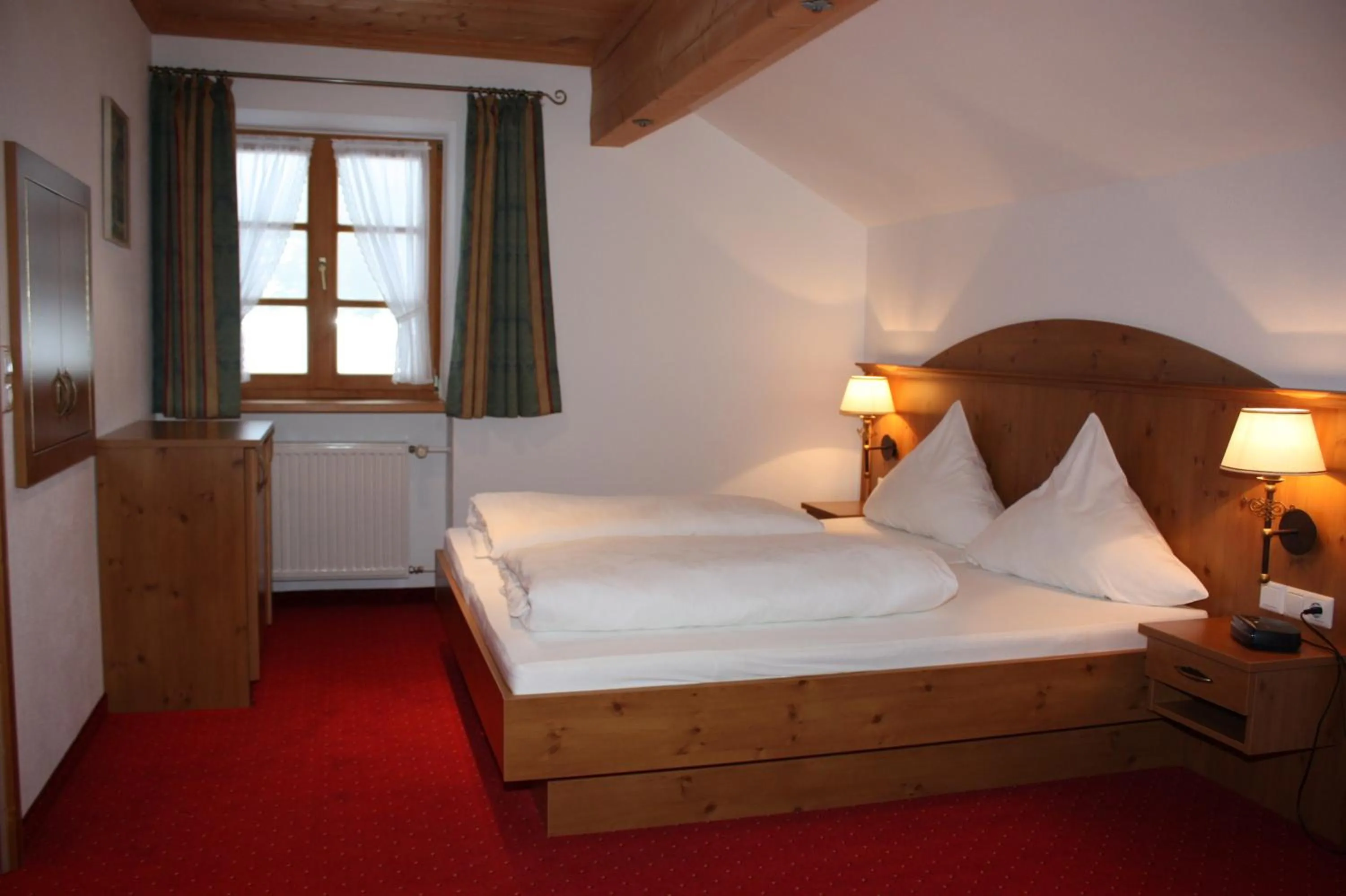 Photo of the whole room, Bed in Gasthaus Aiplspitz