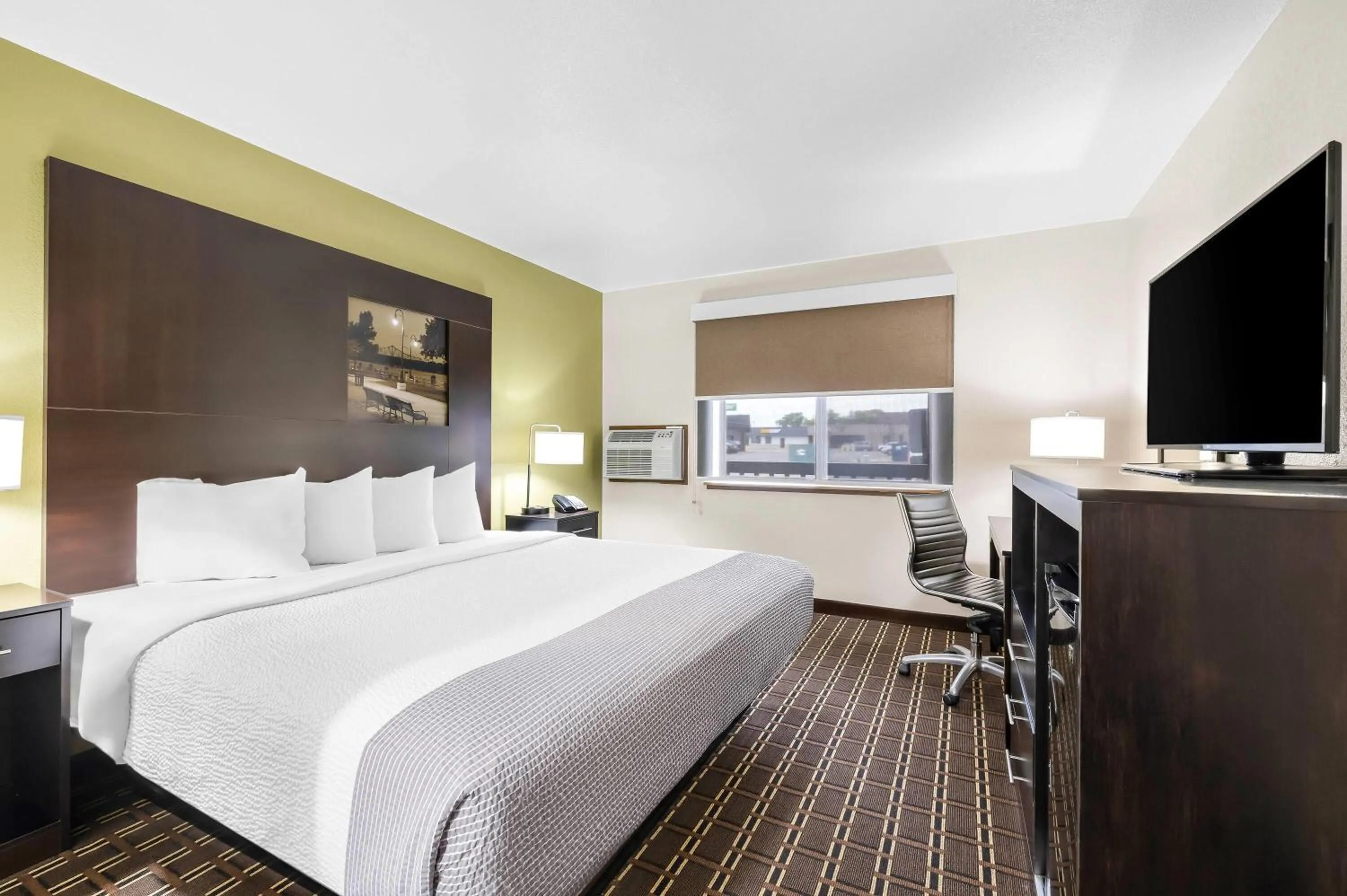 Bed in Super 8 by Wyndham La Crosse