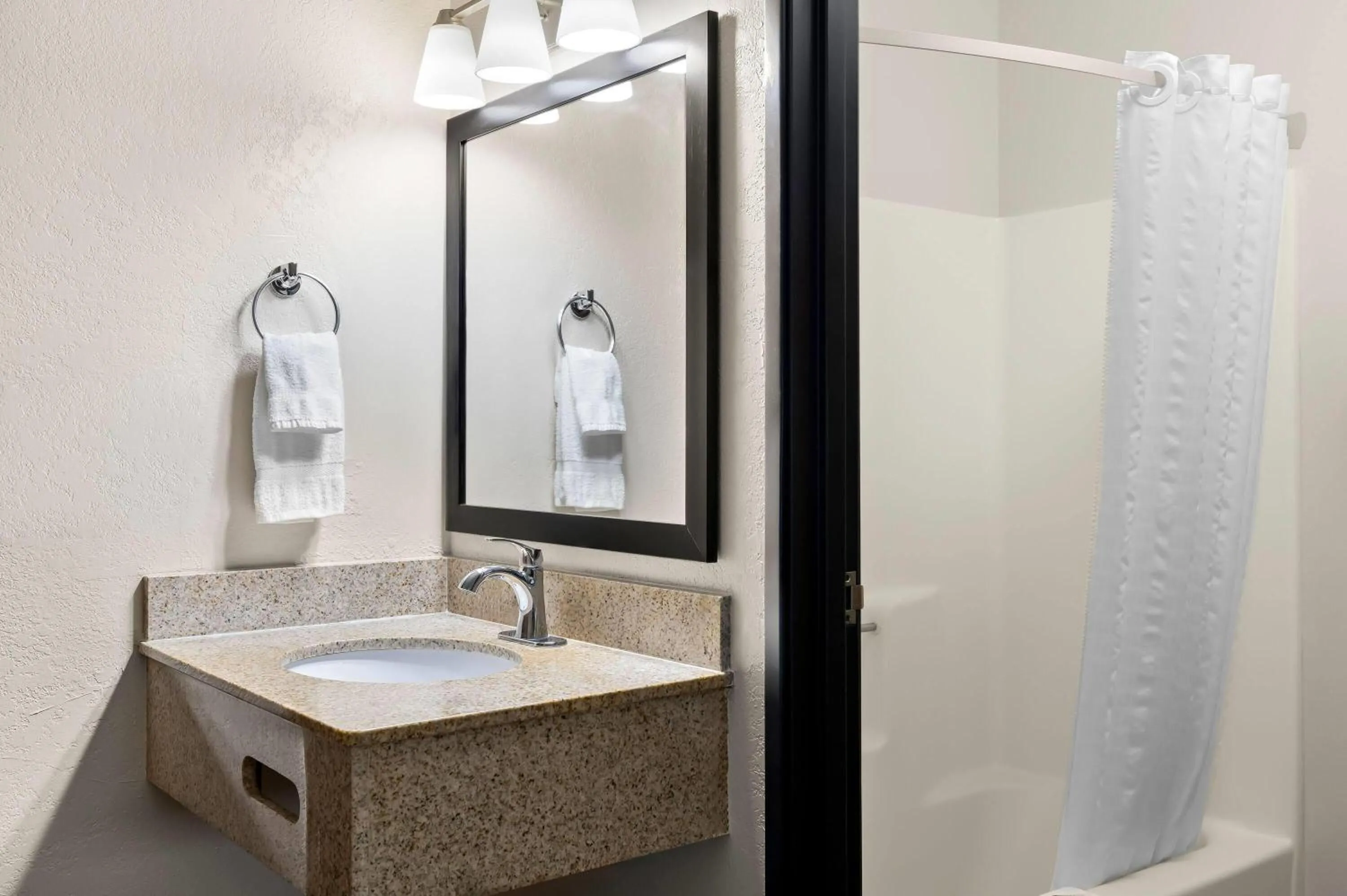 Bathroom in Super 8 by Wyndham La Crosse