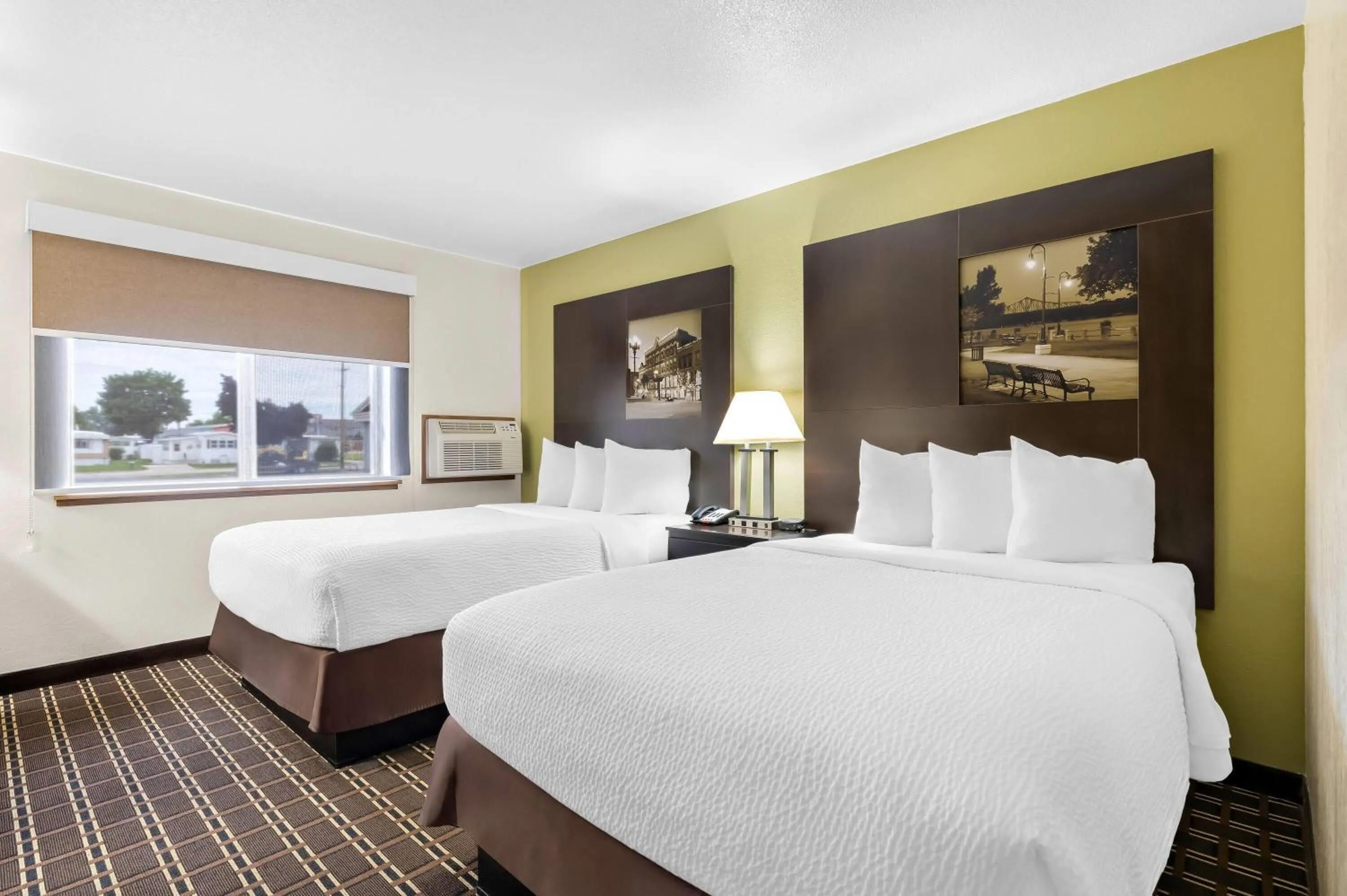 Bed in Super 8 by Wyndham La Crosse