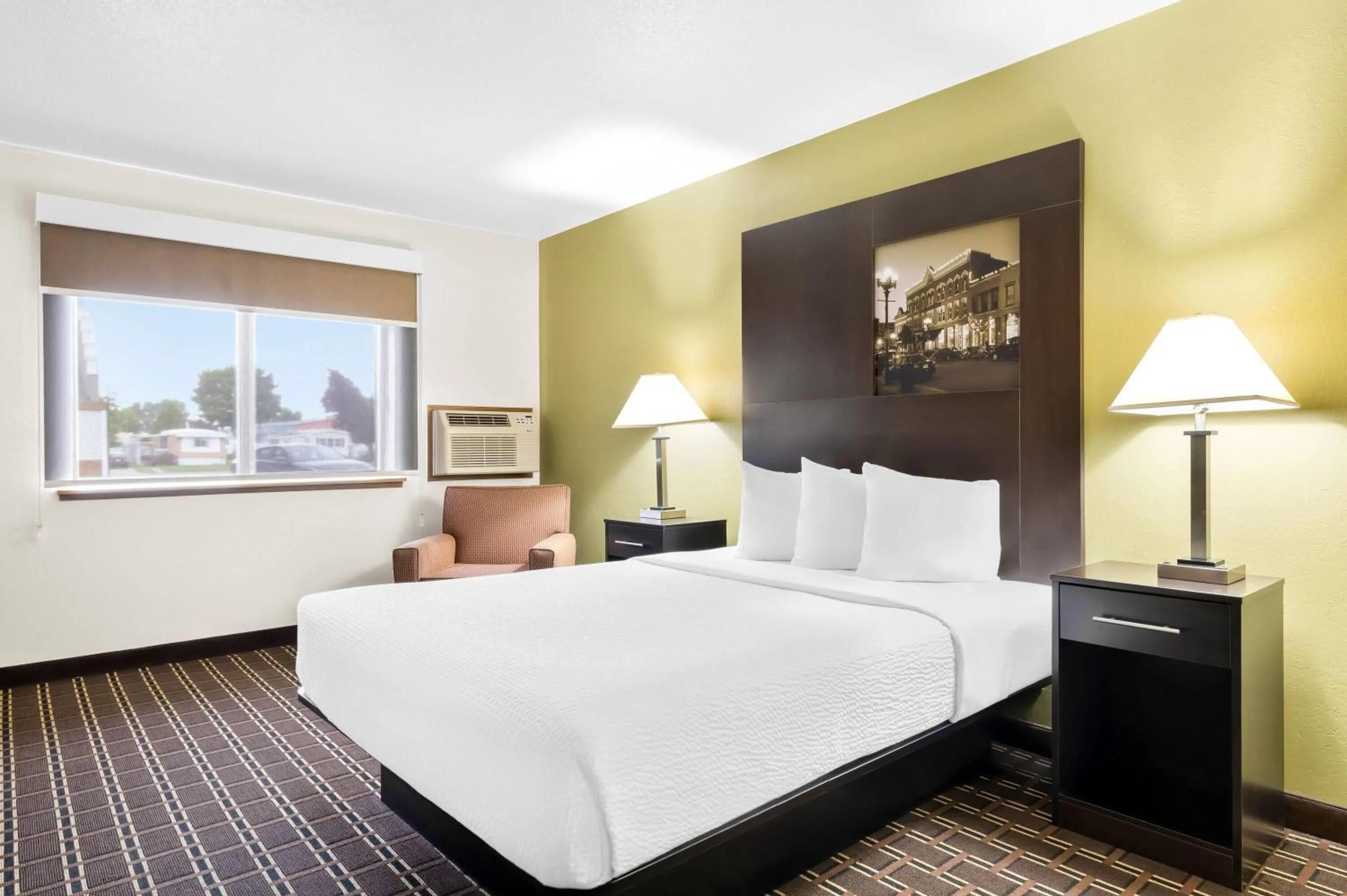 Bed in Super 8 by Wyndham La Crosse