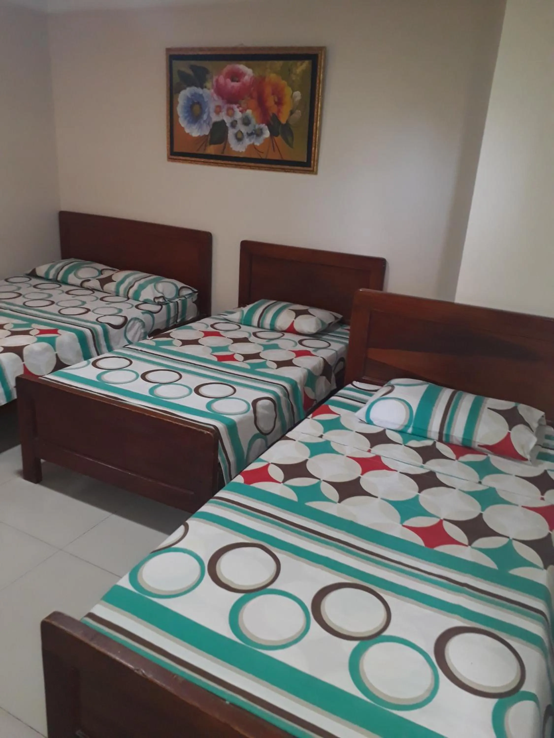 Bed in Hotel Granada Inn