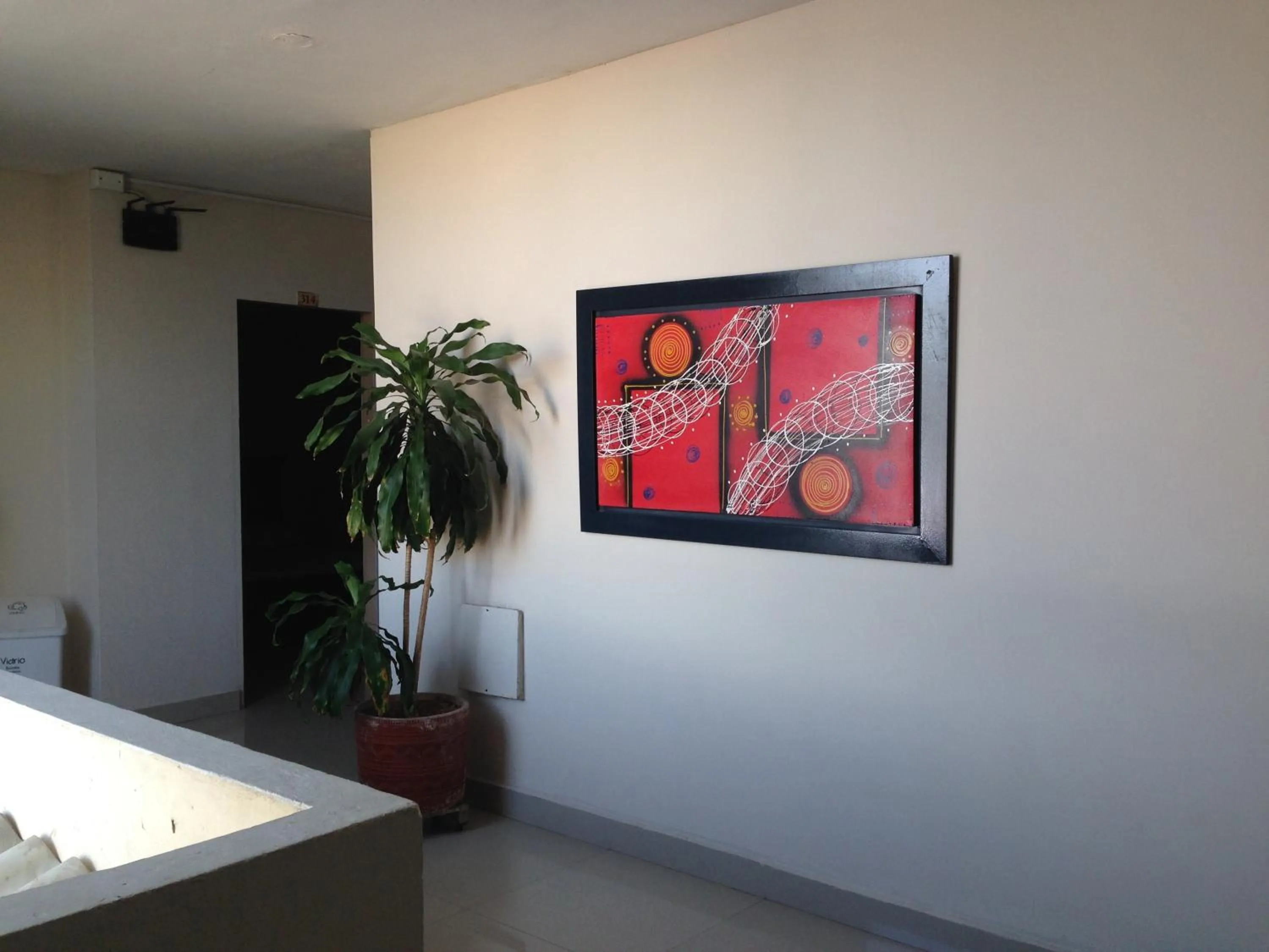 Communal lounge/ TV room in Hotel Granada Inn