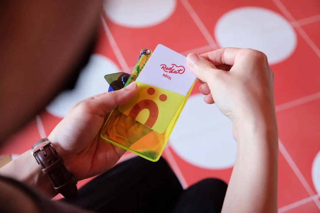 Property logo or sign in Reddot Hotel