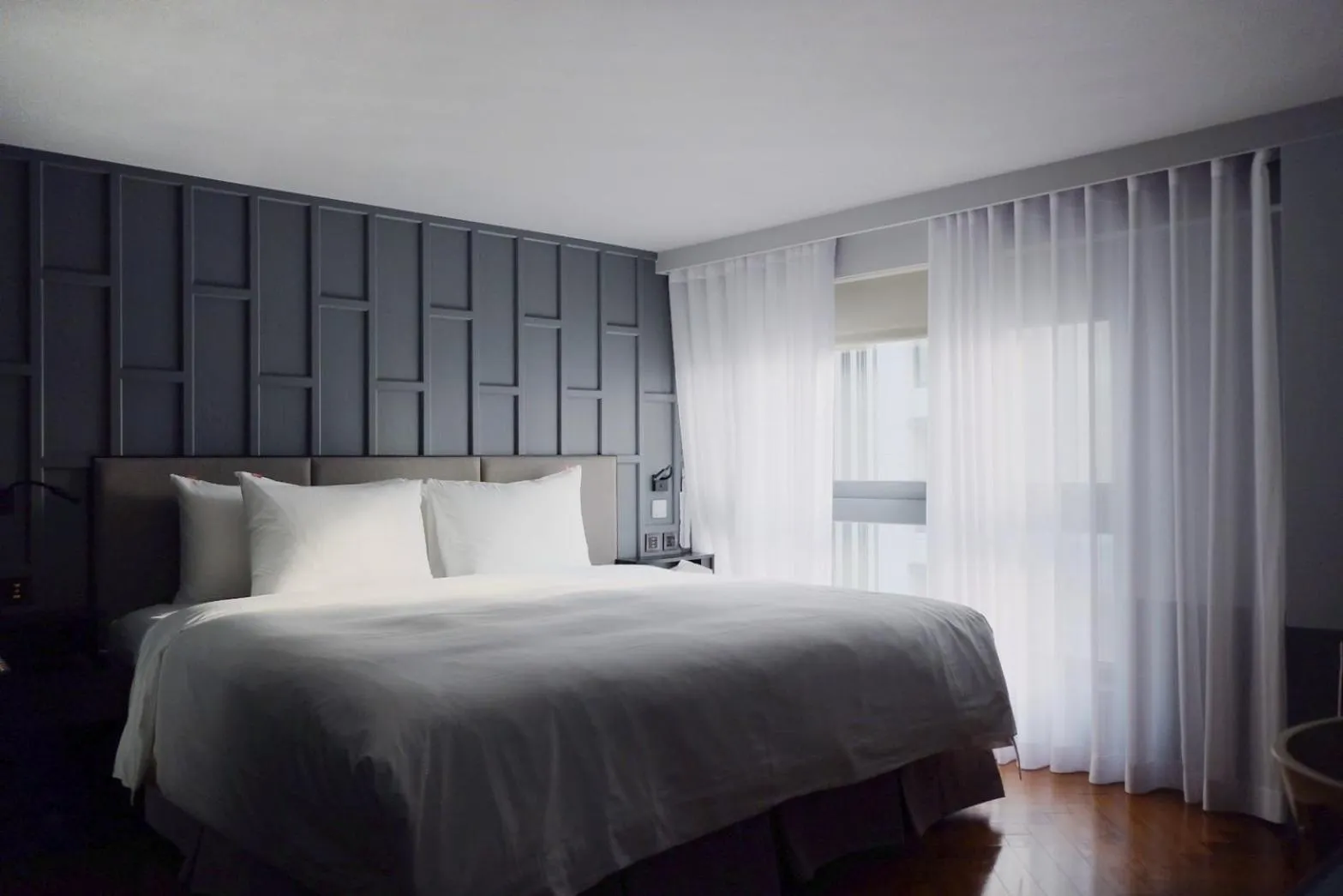 Bed in Reddot Hotel