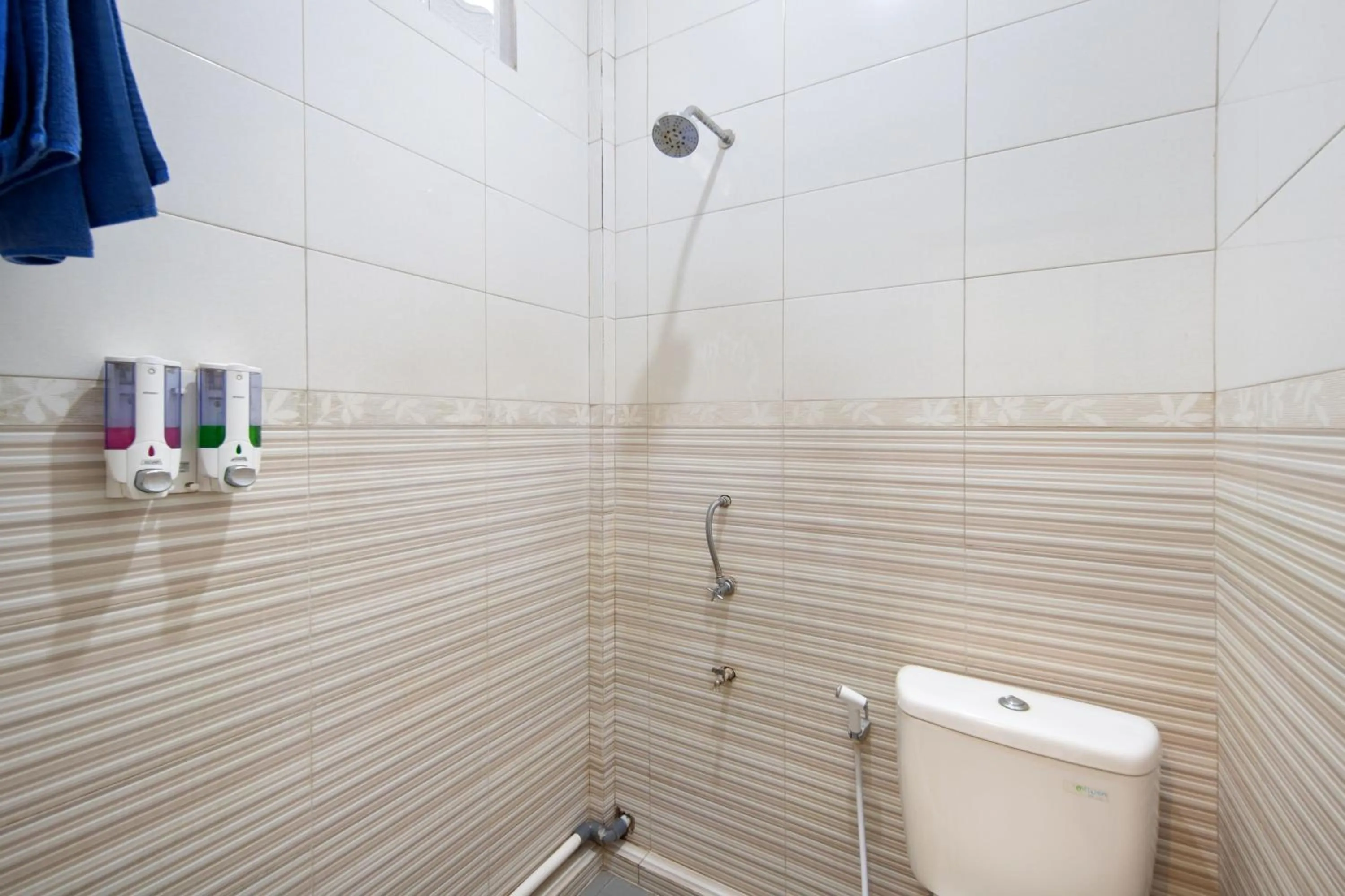 Bathroom in Angkul Angkul Beach Inn Kuta by Kamara