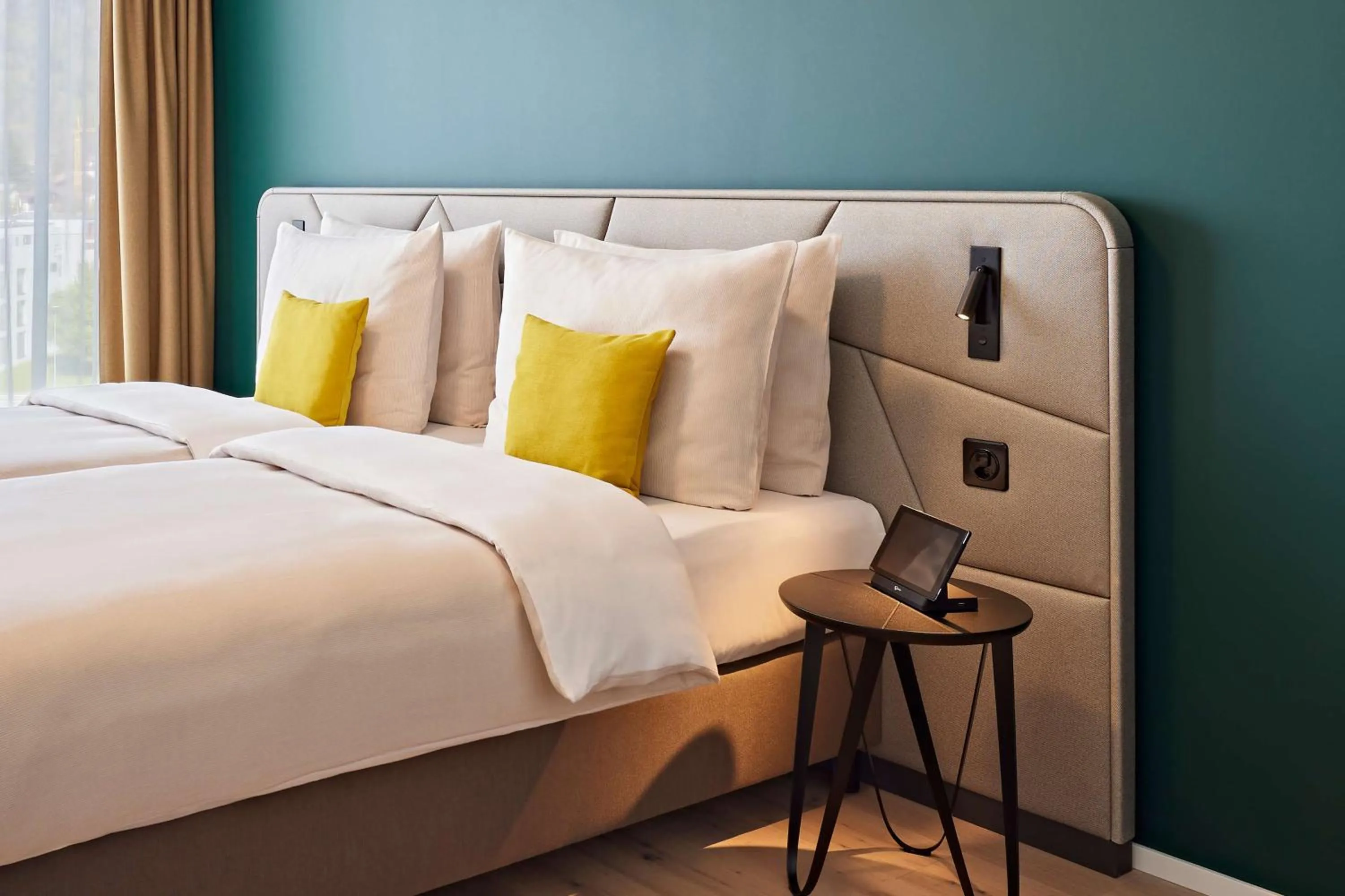 Photo of the whole room, Bed in Essential by Dorint Interlaken - New Opening