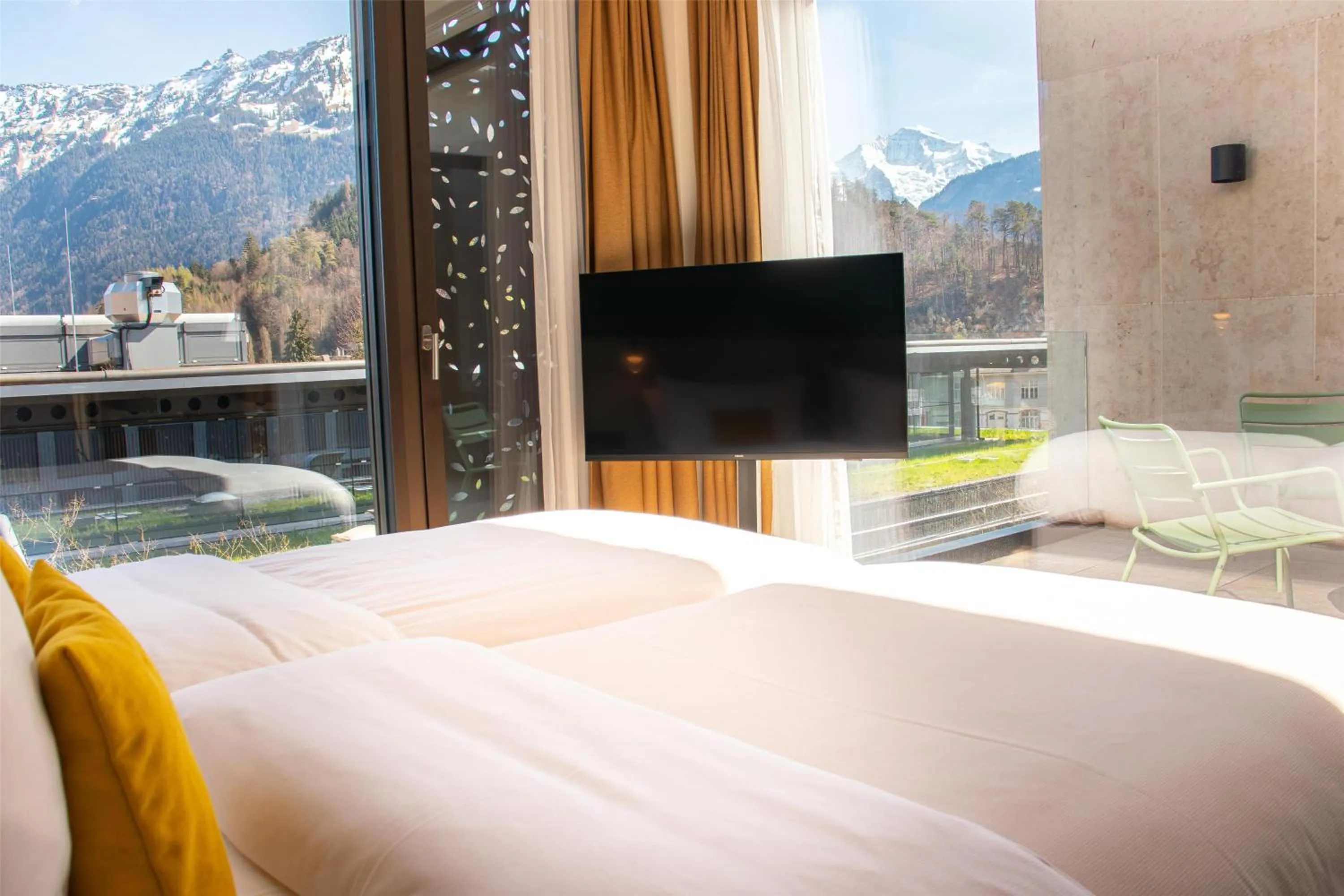 Photo of the whole room, Bed in Essential by Dorint Interlaken - New Opening