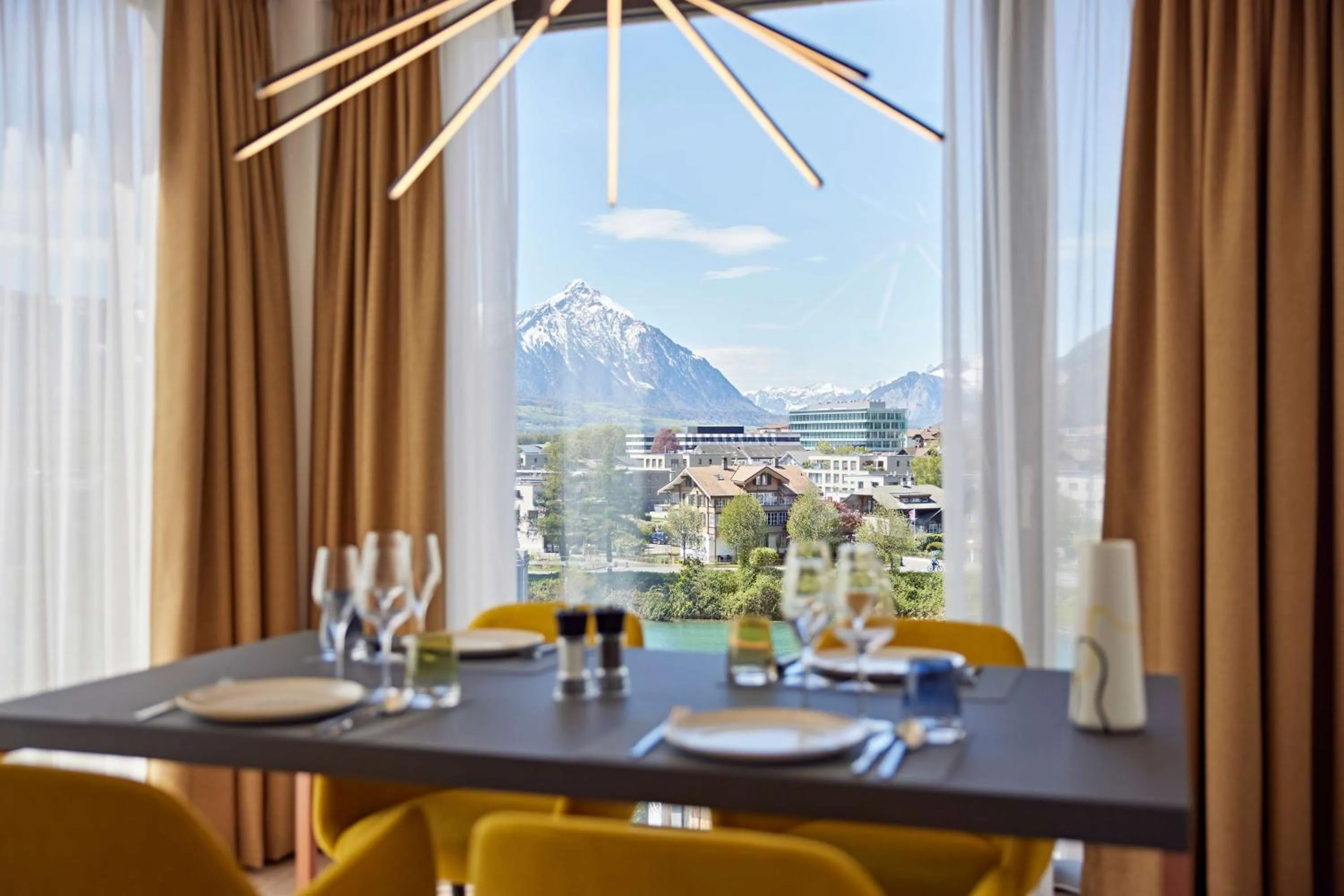 Photo of the whole room in Essential by Dorint Interlaken - New Opening