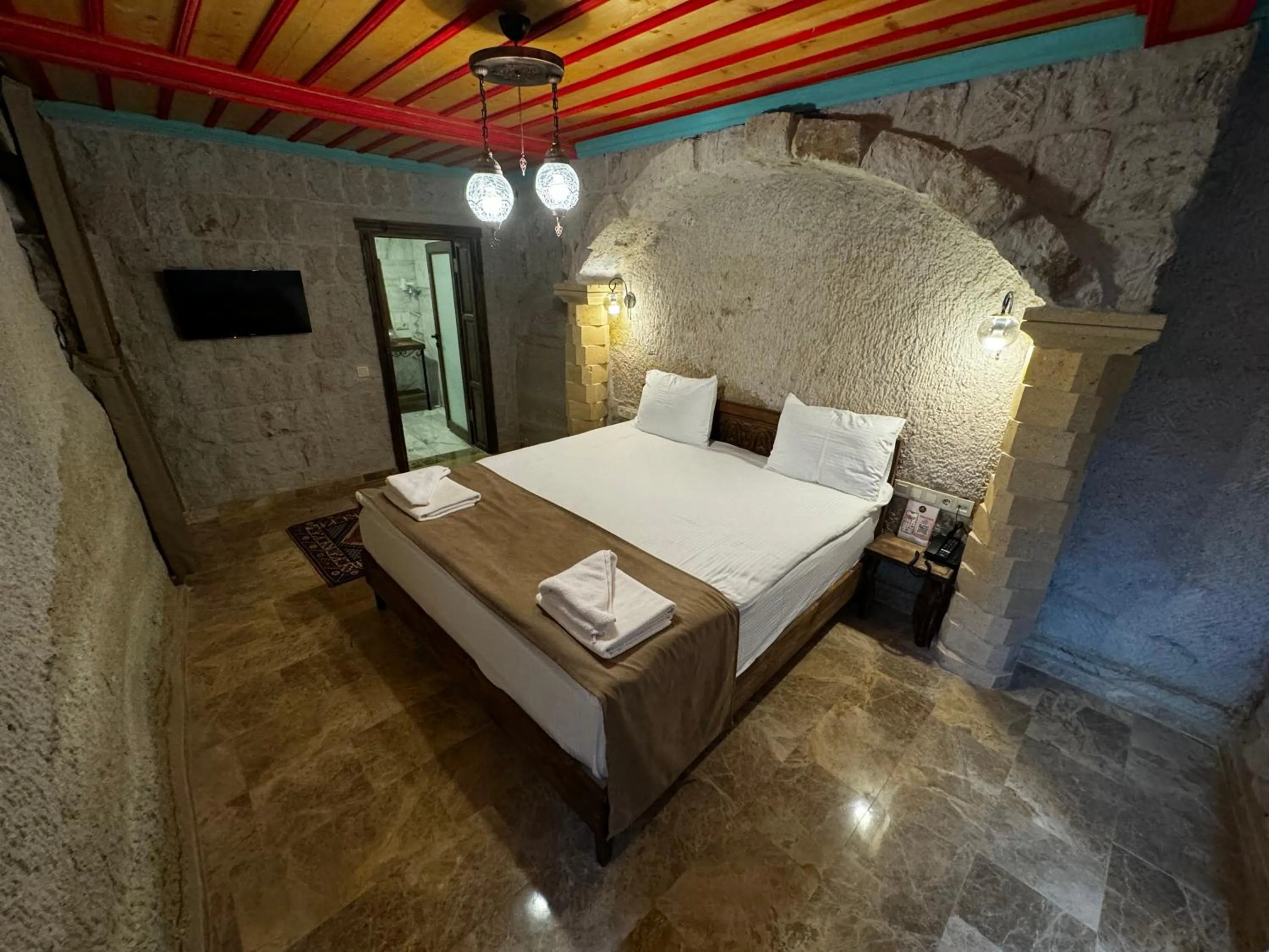 Bed in Rustic Caves