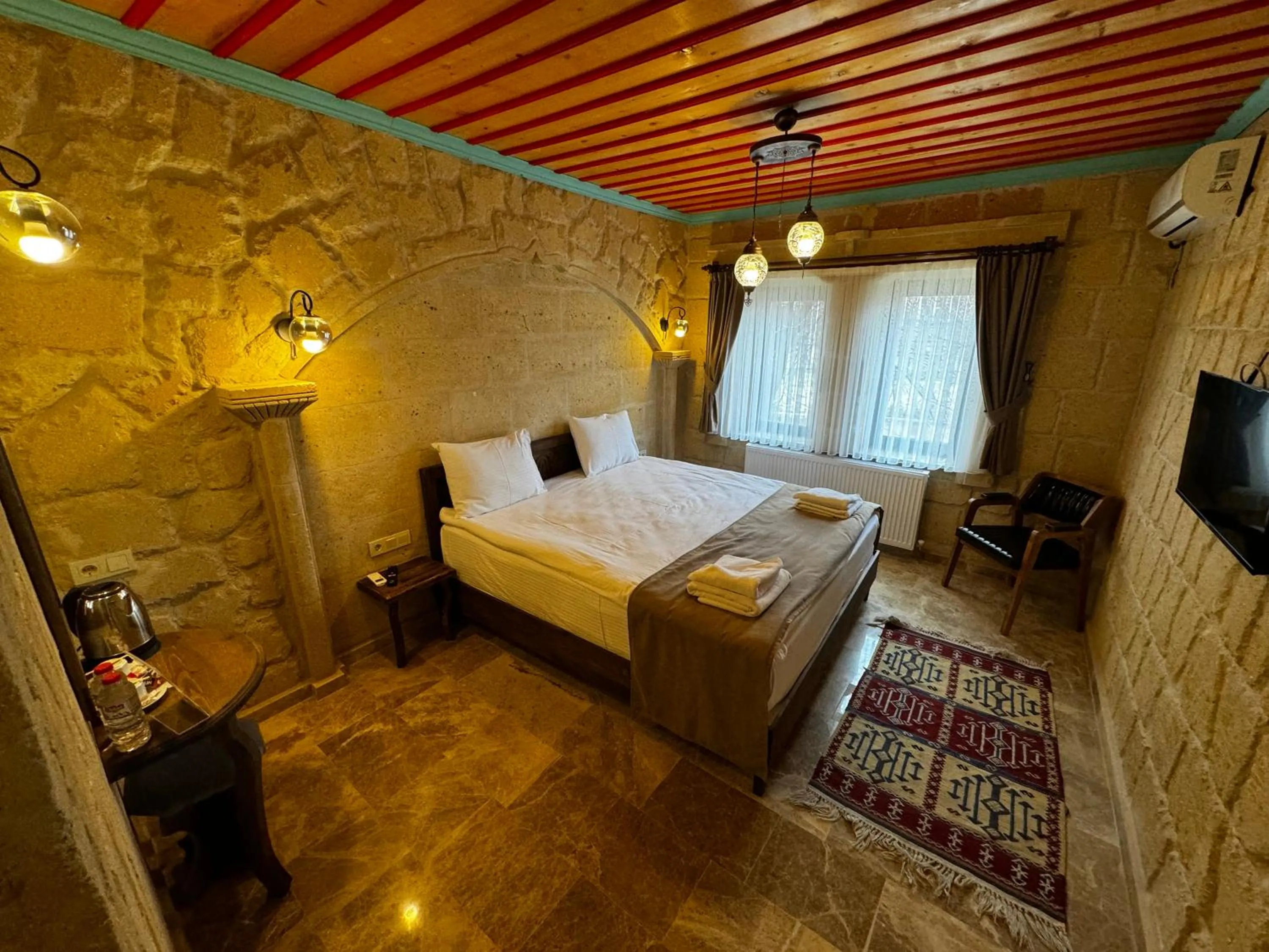 Bed in Rustic Caves