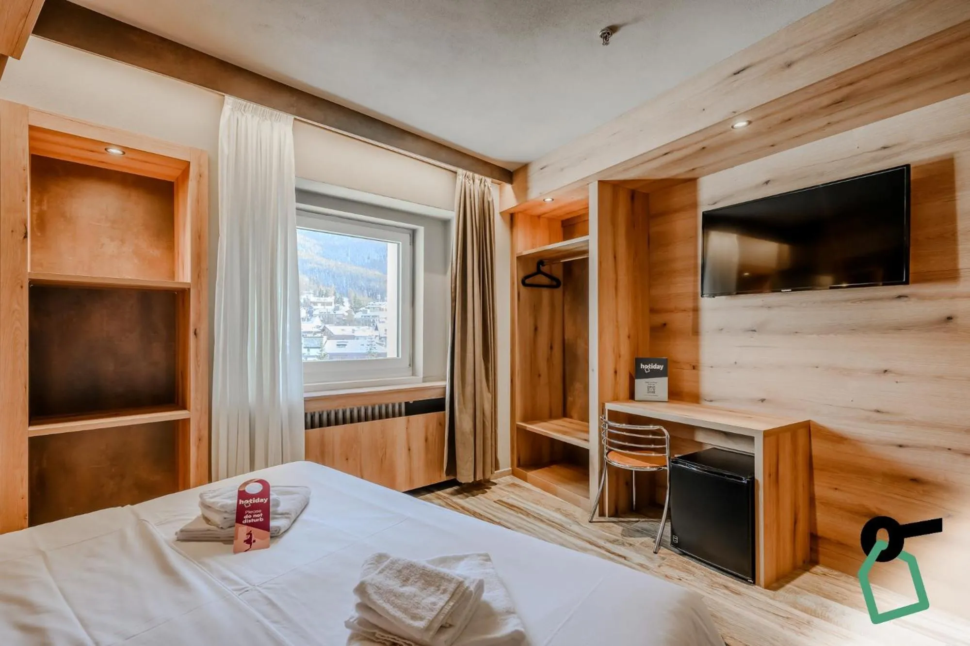 Photo of the whole room, Bed in Hotiday Sauze Torre