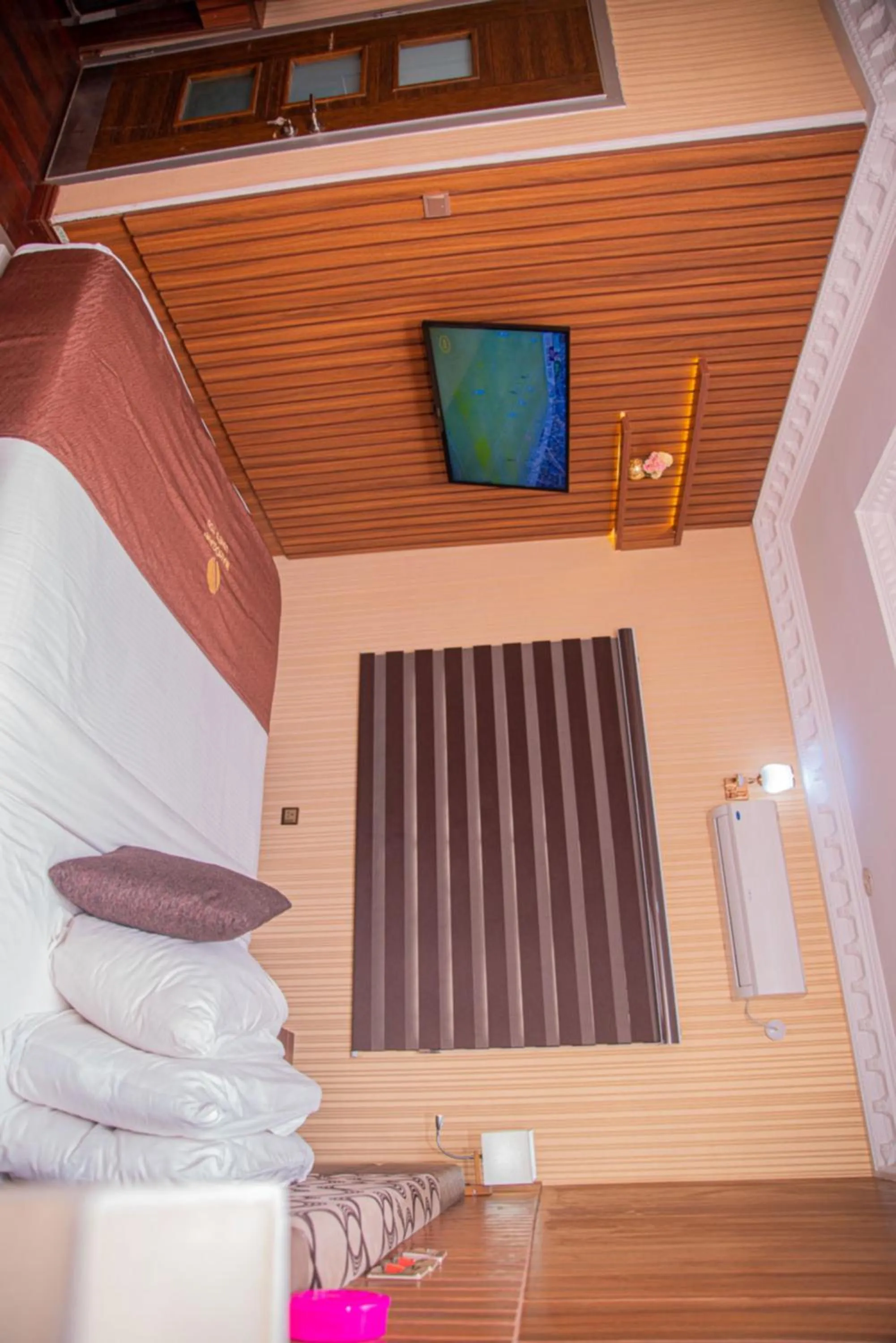 Bedroom in MAHOGANY HOTEL AND SUITES