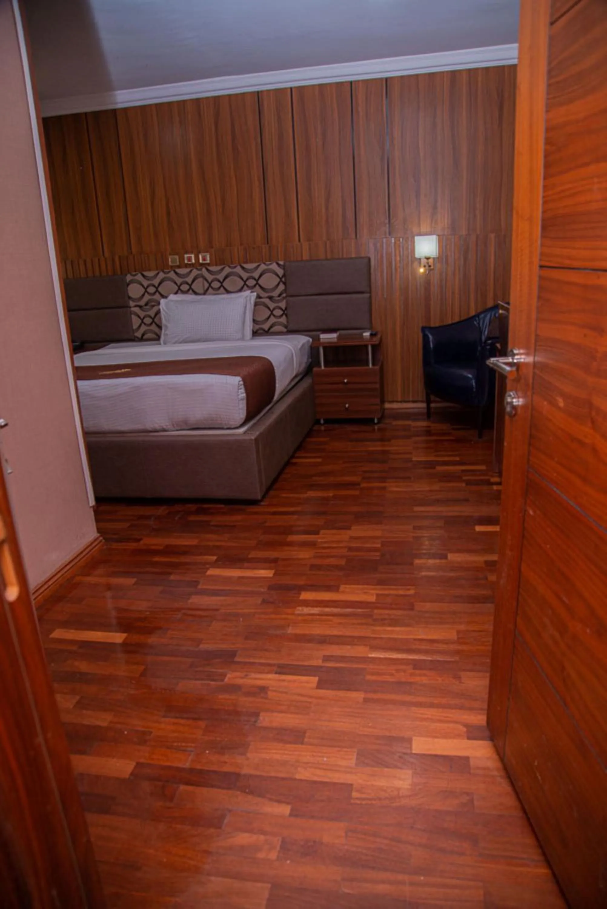 Bedroom in MAHOGANY HOTEL AND SUITES