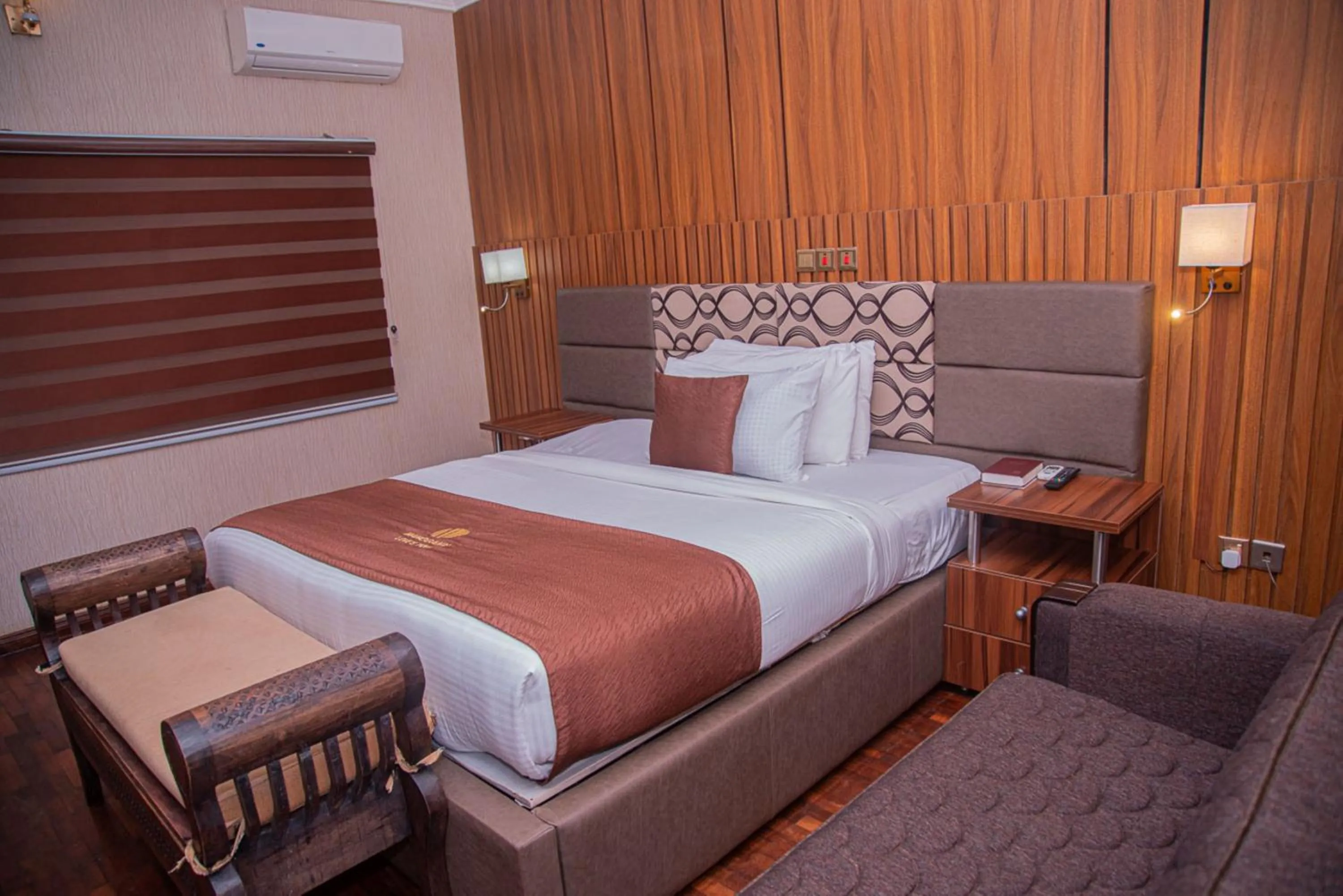 Bedroom in MAHOGANY HOTEL AND SUITES