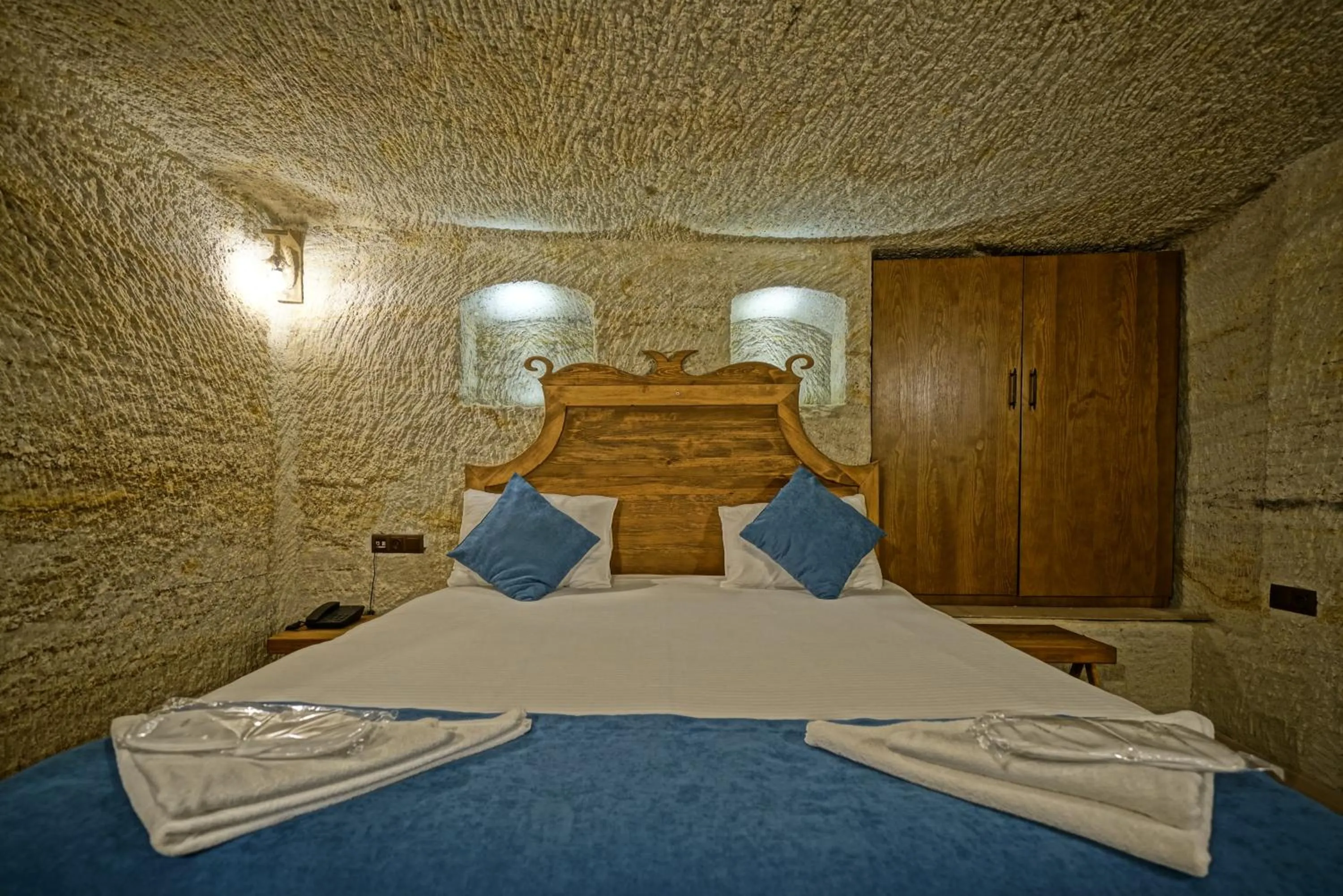 Bed in Cappa Cave Hotel