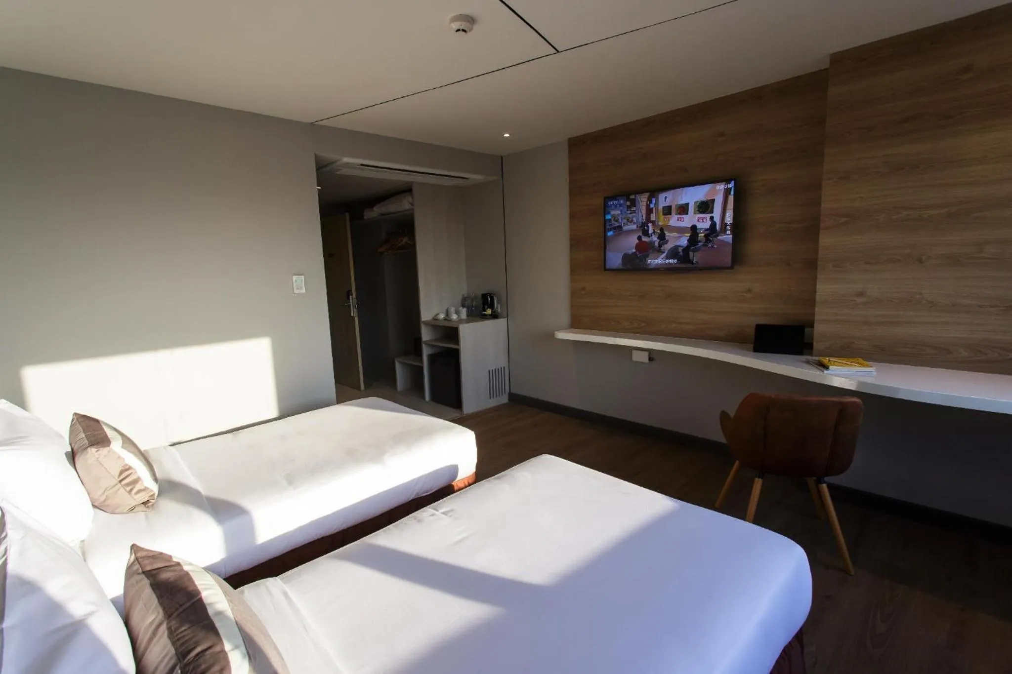 Bed in Jazzotel Bangkok